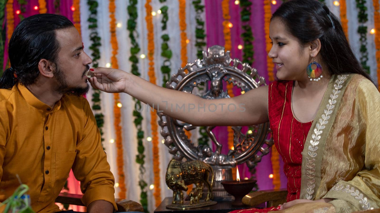 Indian family celebrating Raksha Bandhan festival. by stocksvids