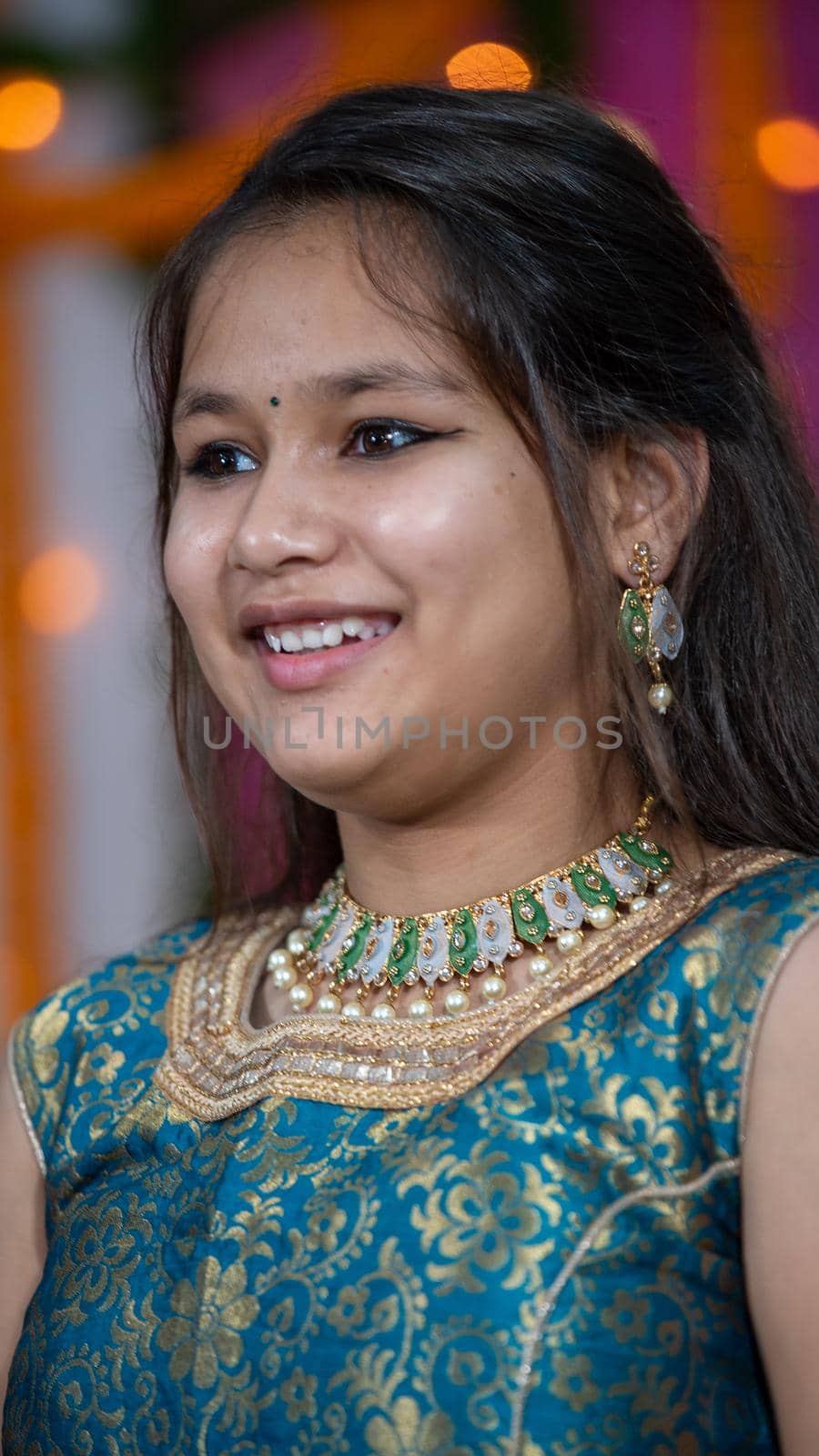 Indian children wearing ethnic Indian dress during Raksha Bandhan, a festival to celebrate the bond between brother-sister. Decoration in Indian houses.