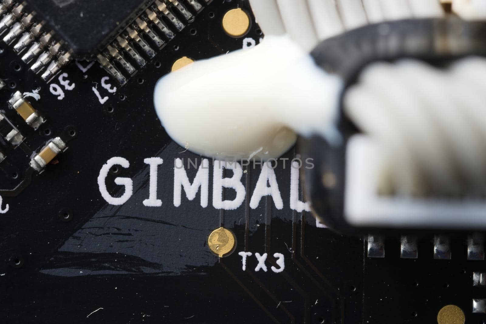 Super macro close up of gimbal area on an electronic drone circuit board. Modern technology and components, these drive a camera stabilization device.