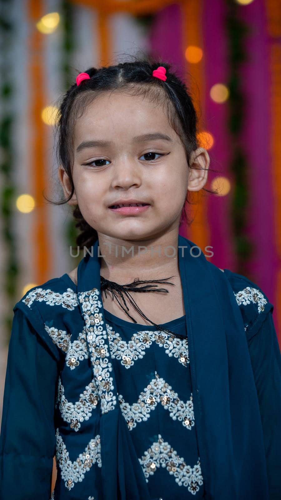 Indian children wearing ethnic Indian dress during Raksha Bandhan, a festival to celebrate the bond between brother-sister. Decoration in Indian houses.