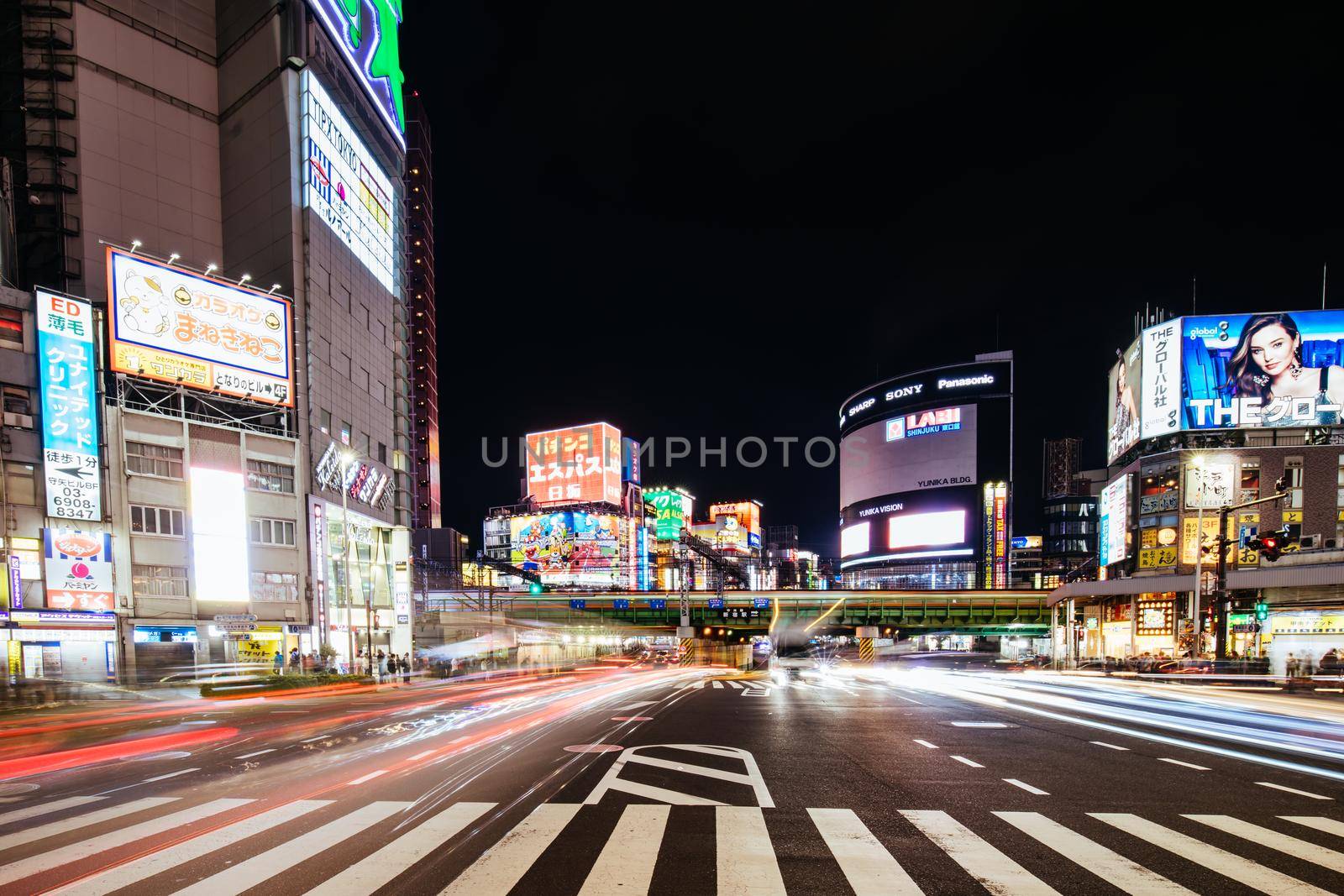 Shinjuku, Japan, May 18 2019: Neon signs illuminate Tokyo s busy Shinjuku neighborhood at night