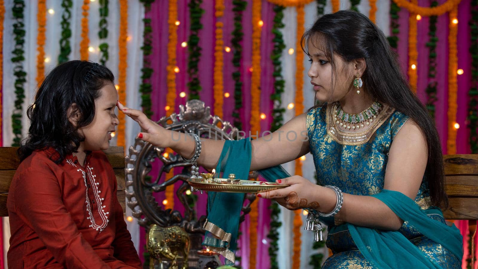 Indian family celebrating Raksha Bandhan festival. by stocksvids