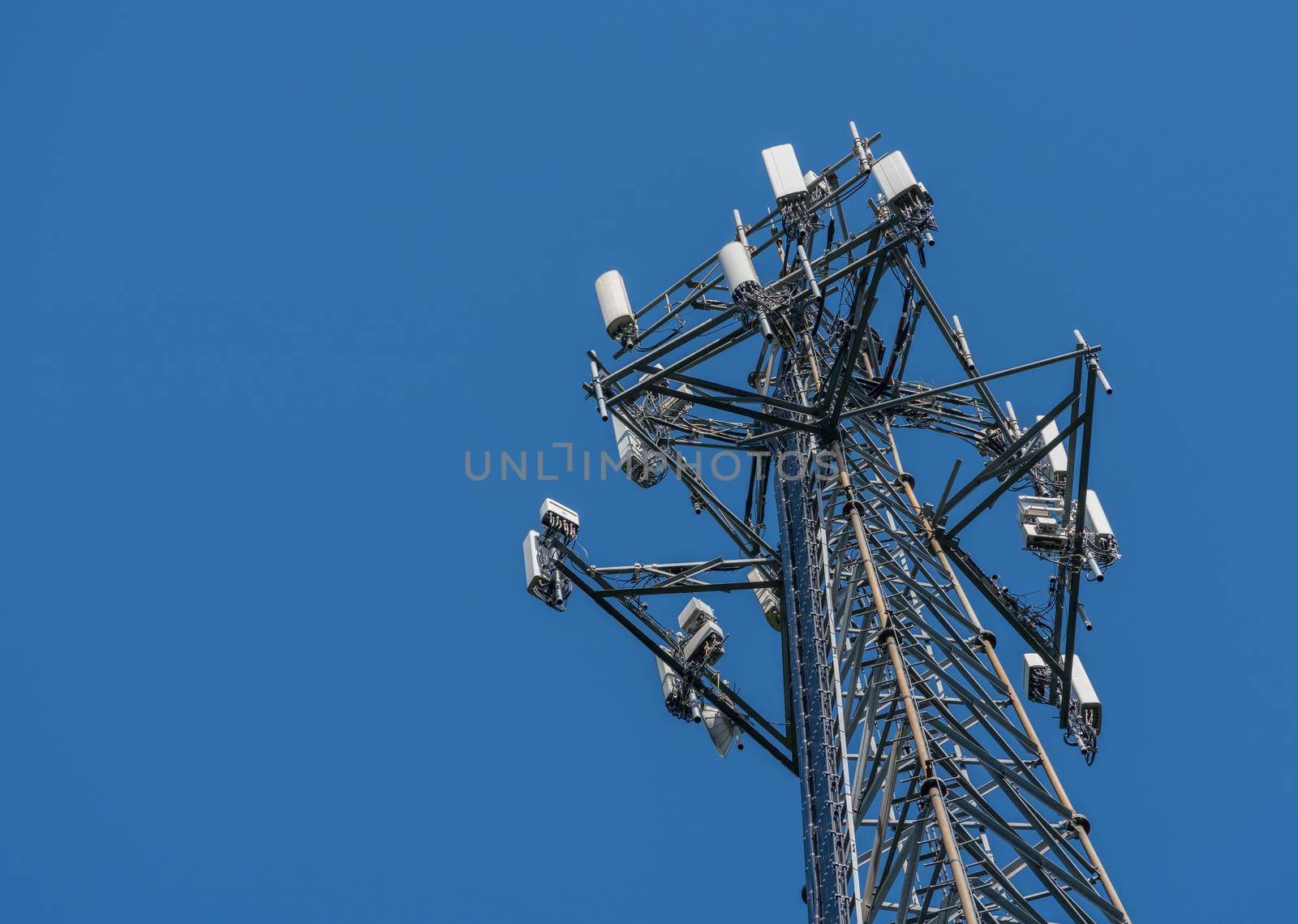 Aerial view of mobile phone cell tower to illustrate lack of broadband internet service in rural areas and need for investment