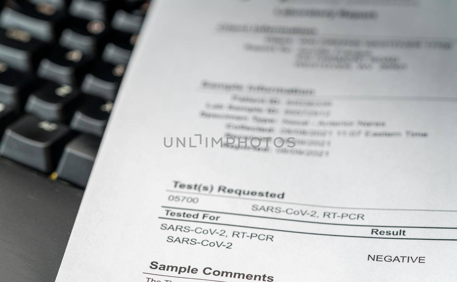 Paper printout showing a negative result for PCR test on nasal swab for SARS-CoV-2 or Covid-19