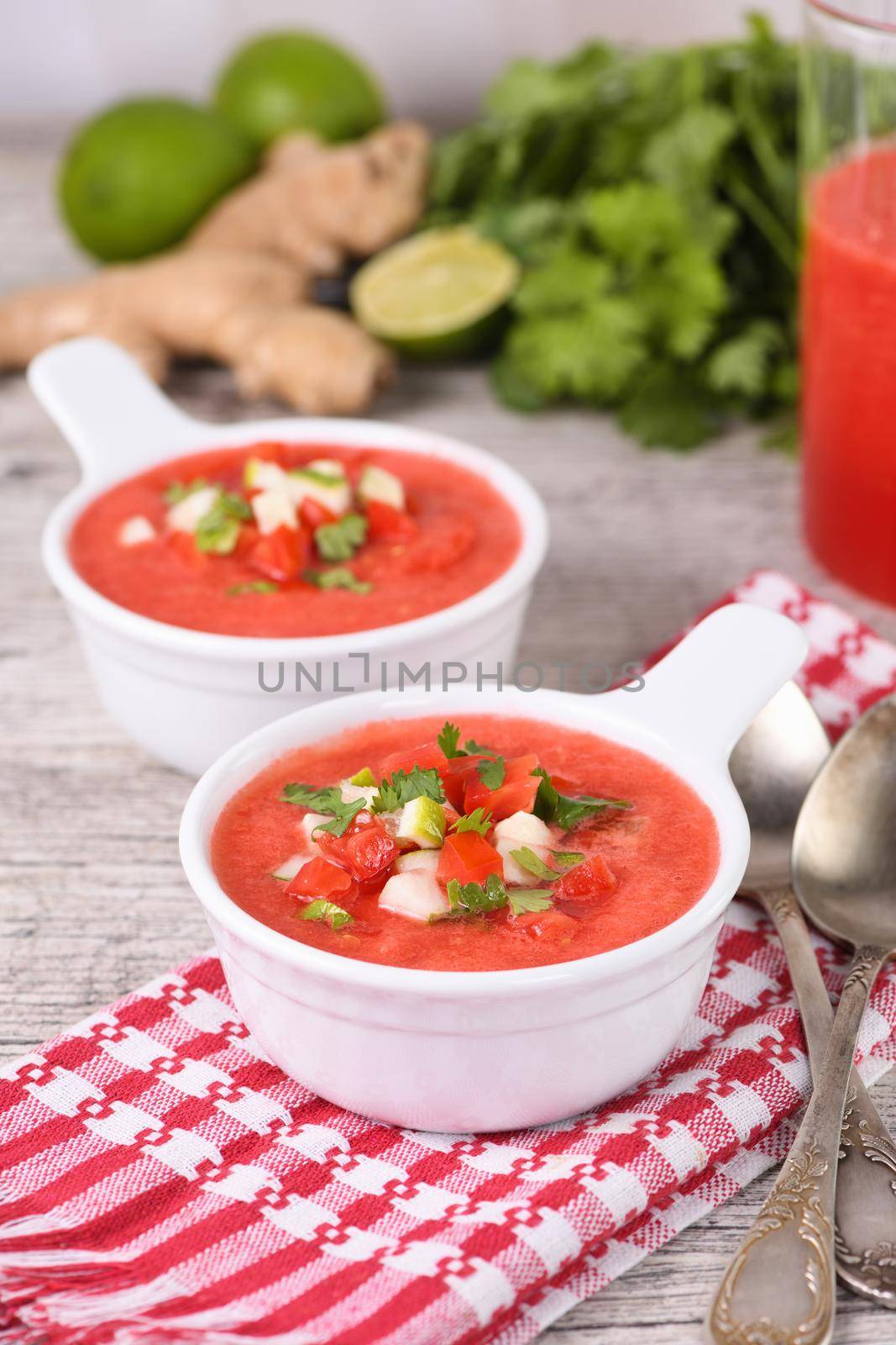 Watermelon tomato gazpacho in bowls by Apolonia