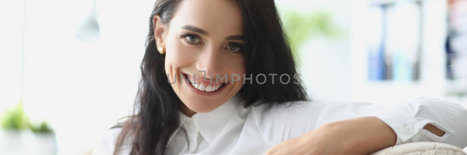 Portrait of beautiful brunette young woman chilling with cup of hot drink. Pause from work or dayoff at home. Coffee break, lunch, relax, happiness concept