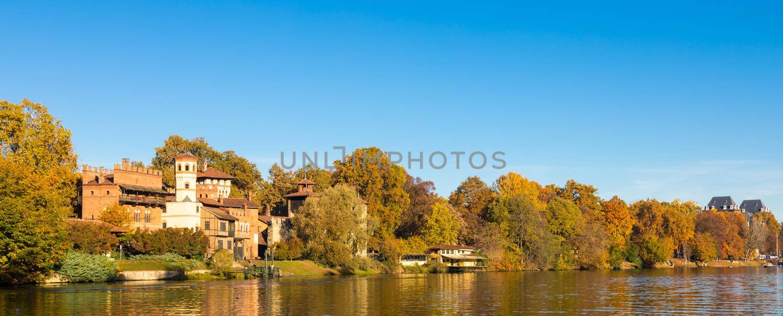 Turin, Italy - Circa November 2021: outdoors panorama with scenic Turin Valentino castle at sunrise in autumn