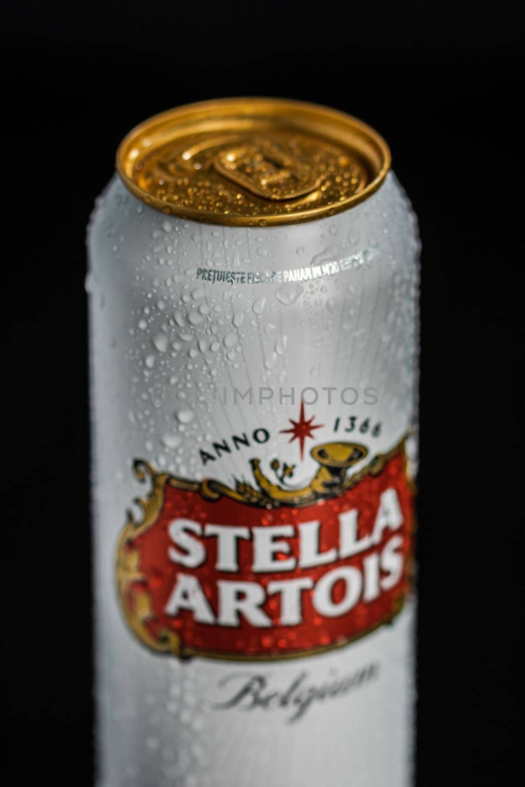 Condensation water droplets on Stella Artois beer can isolated on black. Bucharest, Romania, 2020 by vladispas