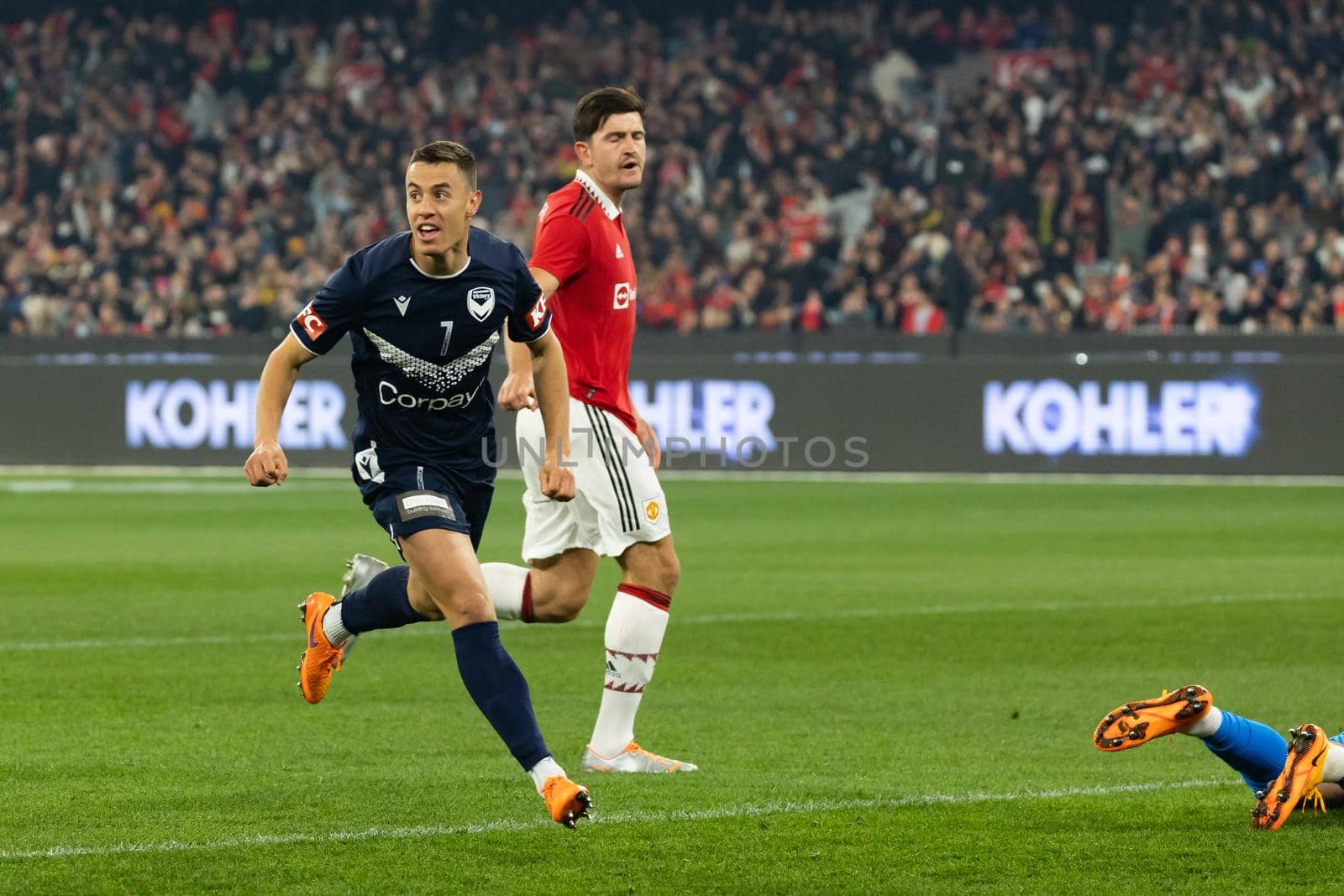 MELBOURNE, AUSTRALIA - JULY 15: Chris Ikonomidis of Melbourne Victory scores against Manchester United in a pre-season friendly football match at the MCG on 15th July 2022