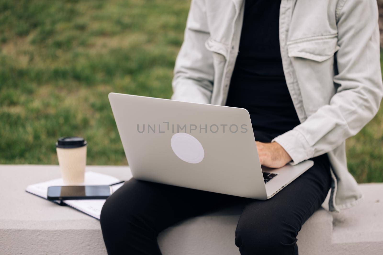 Businessman hands busy working on laptop keyboard for send emails and surf on a web browser. Hands touch typing pointing cloud data social network media. Human hands on laptop computer keyboard. by uflypro