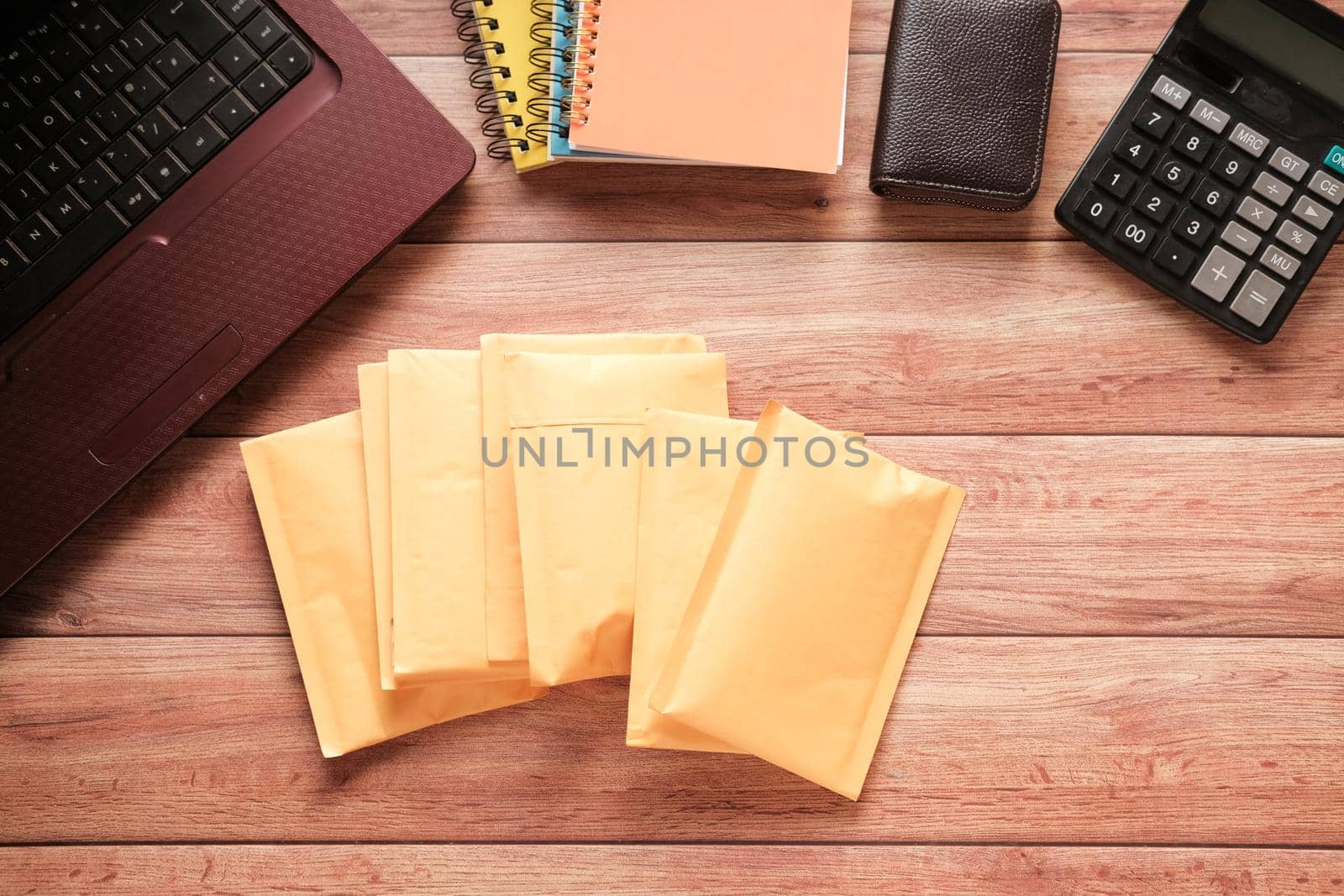 yellow paper bubble envelope on table ,