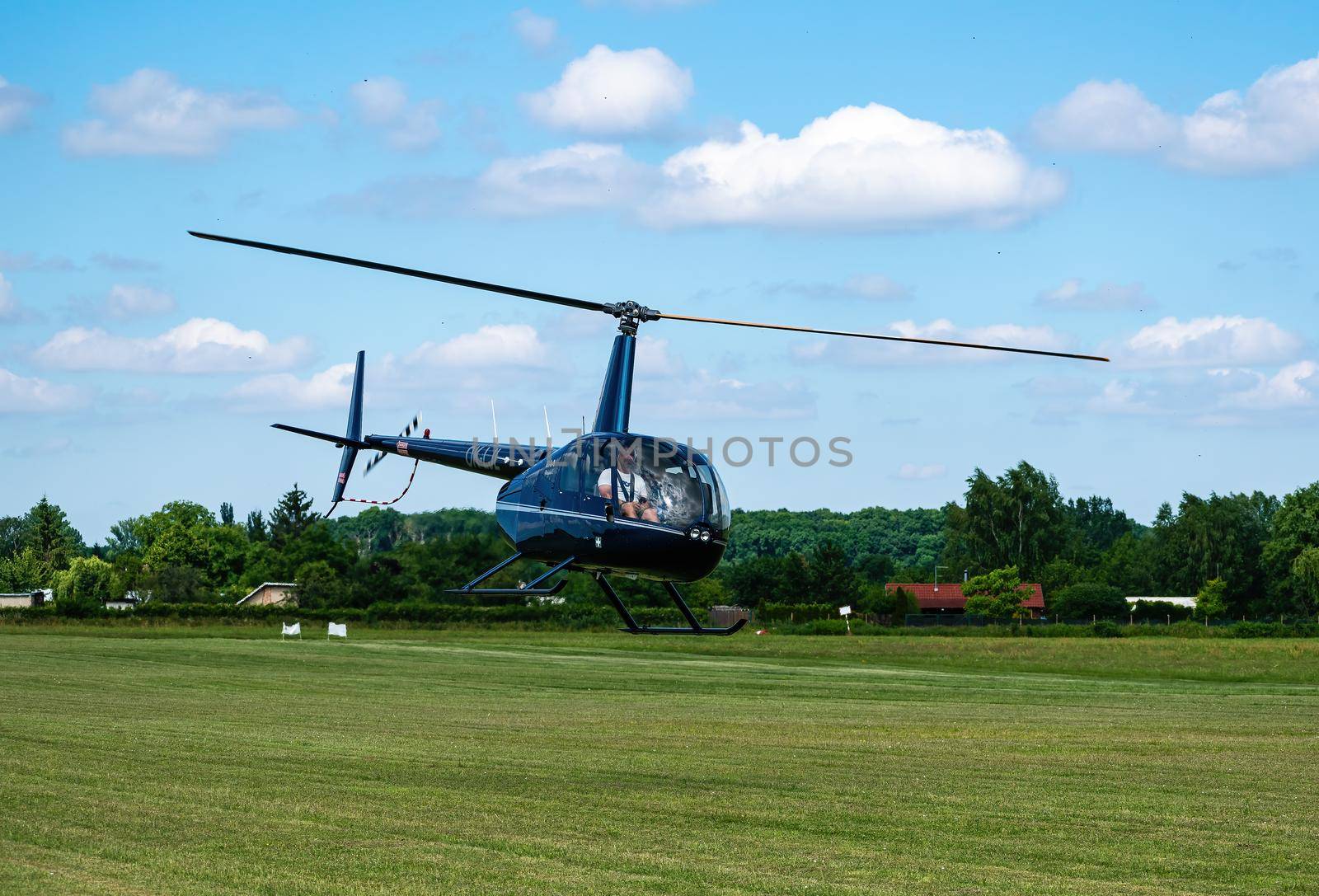 Robinson R-44 helicoptership over the airport at low altitude by rostik924