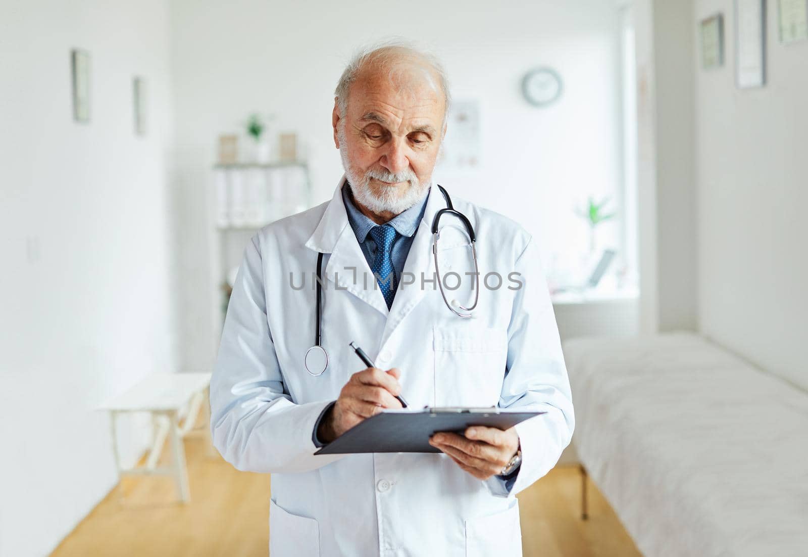 senior doctor hospital medical medicine health care clinic office portrait elderly mature man stethoscope specialist by Picsfive