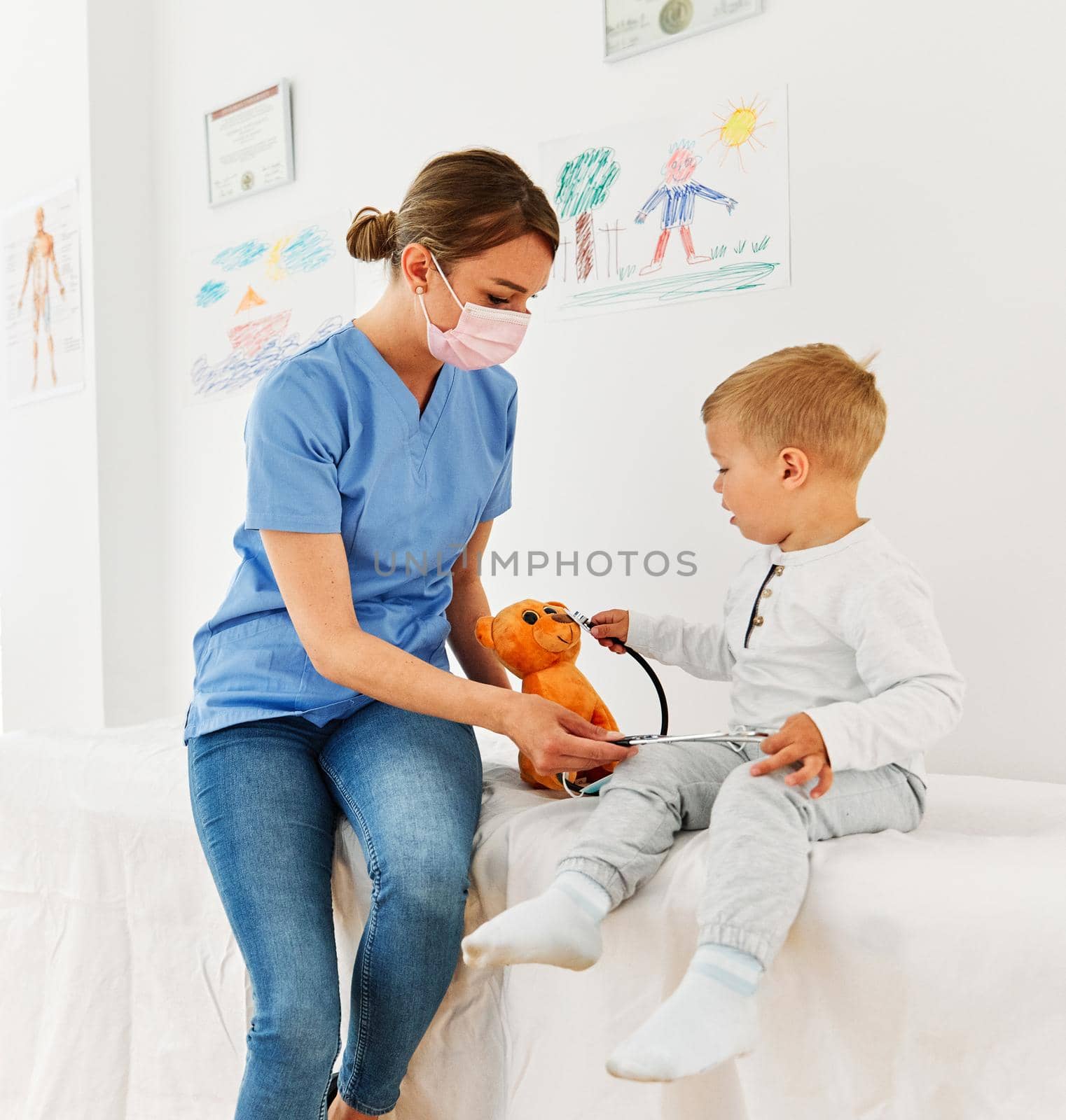 child doctor hospital patient medical nurse medicine health woman boy care healthcare pediatrician stethoscope clinic toy by Picsfive