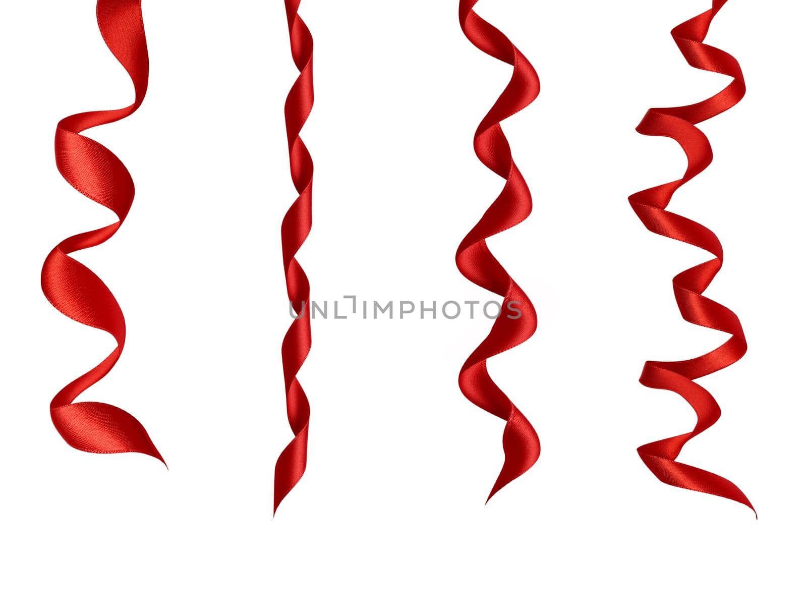 collection of various red ribbon pieces on white background. each one is shot separately