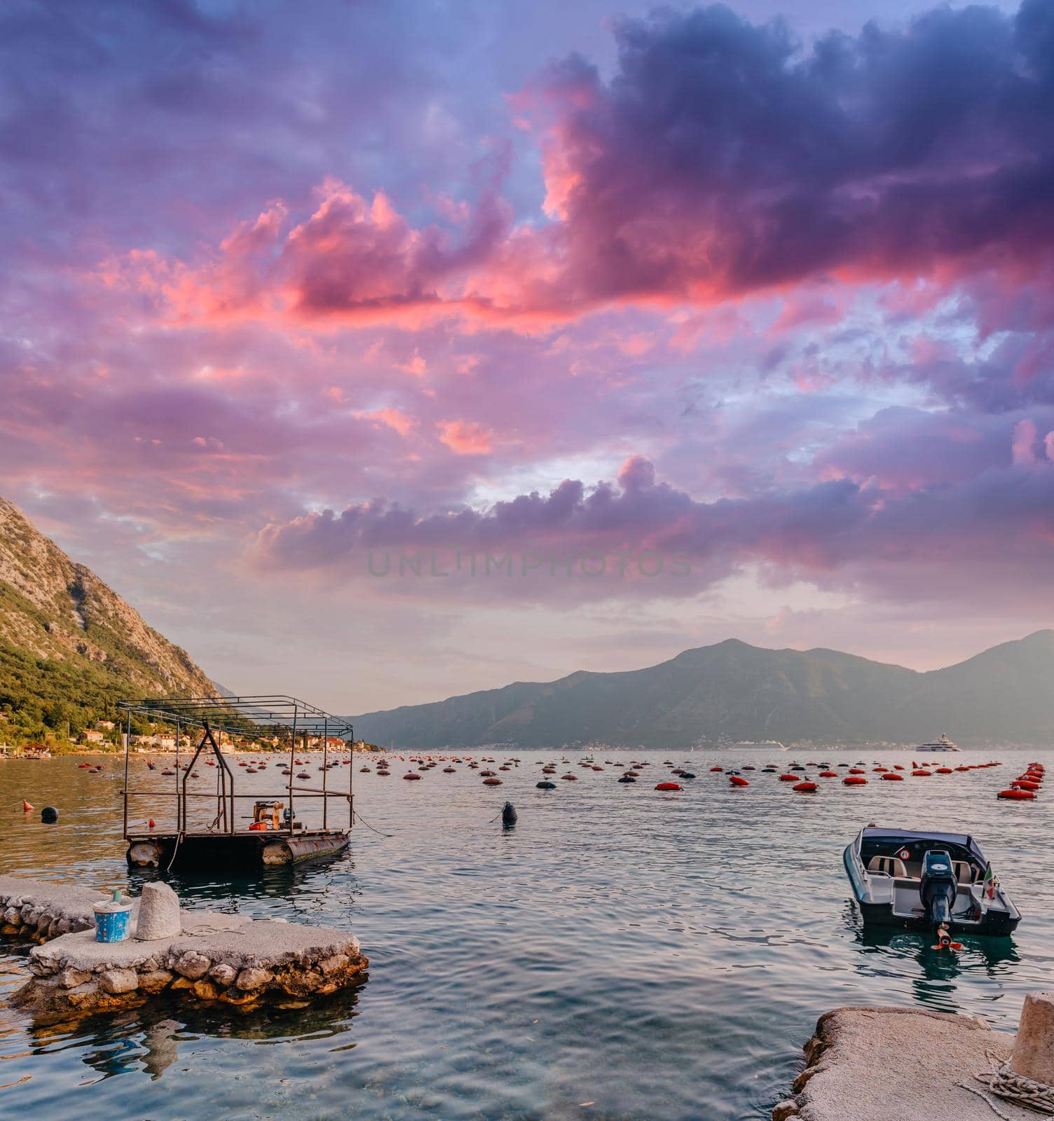 Fishing Boat On An Oyster Farm In The Bay Of Kotor, Montenegro. High Quality Photo by Andrii_Ko