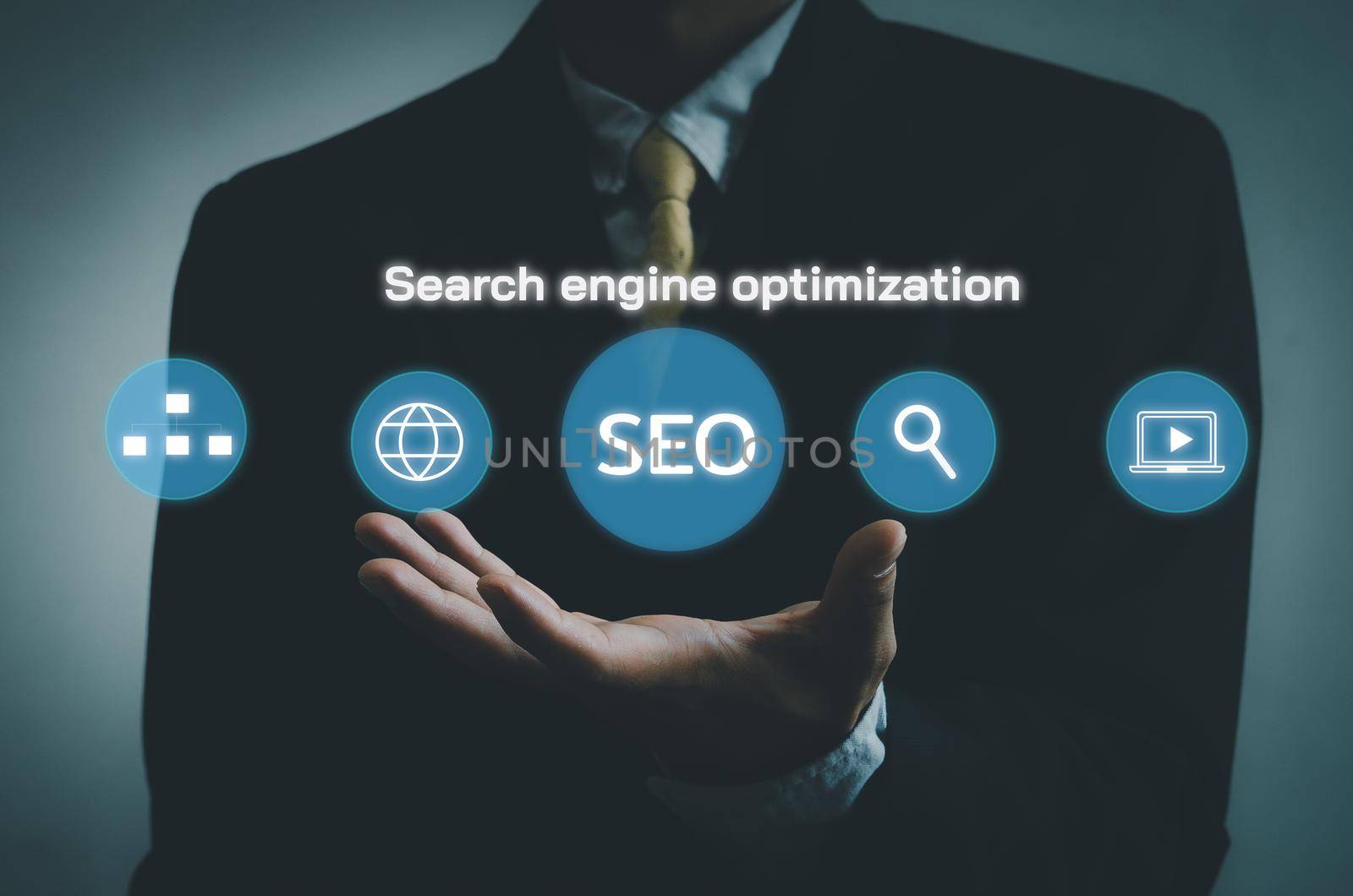 Hand businessman icon SEO Search engine optimization  virtual screen.Social network digital business concept.