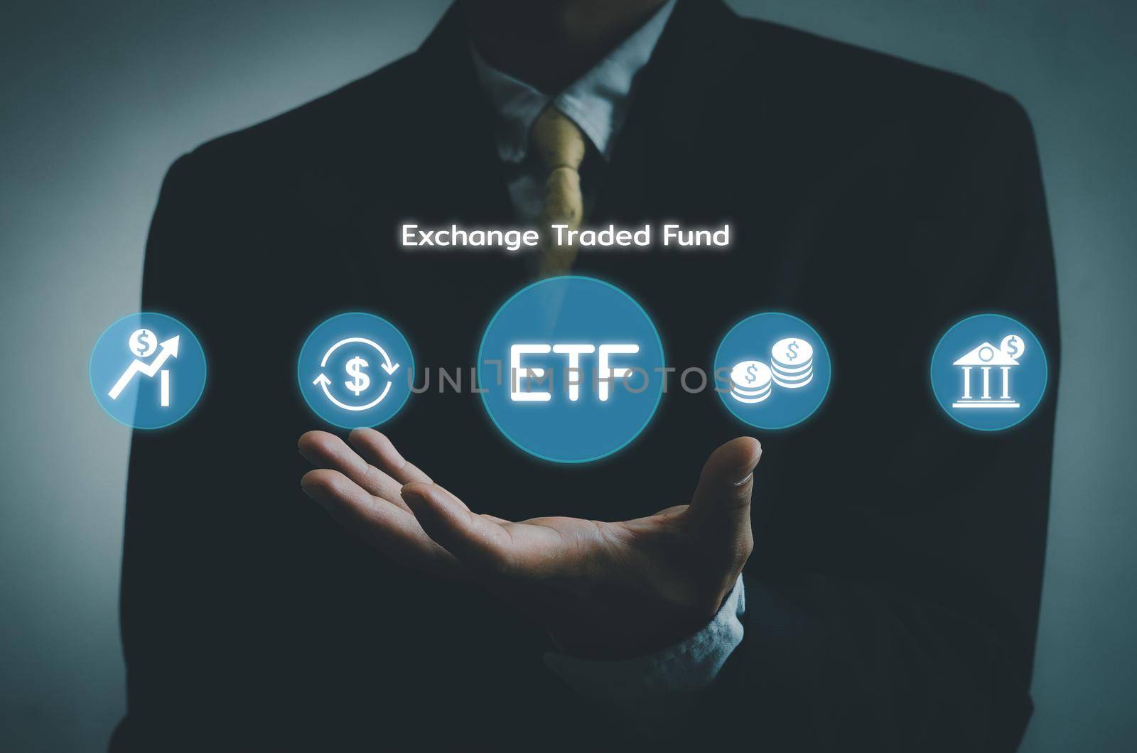 Hand businessman icon ETF Exchange Traded Fund virtual screen Internet Business stock market finance Index Fund Concept.