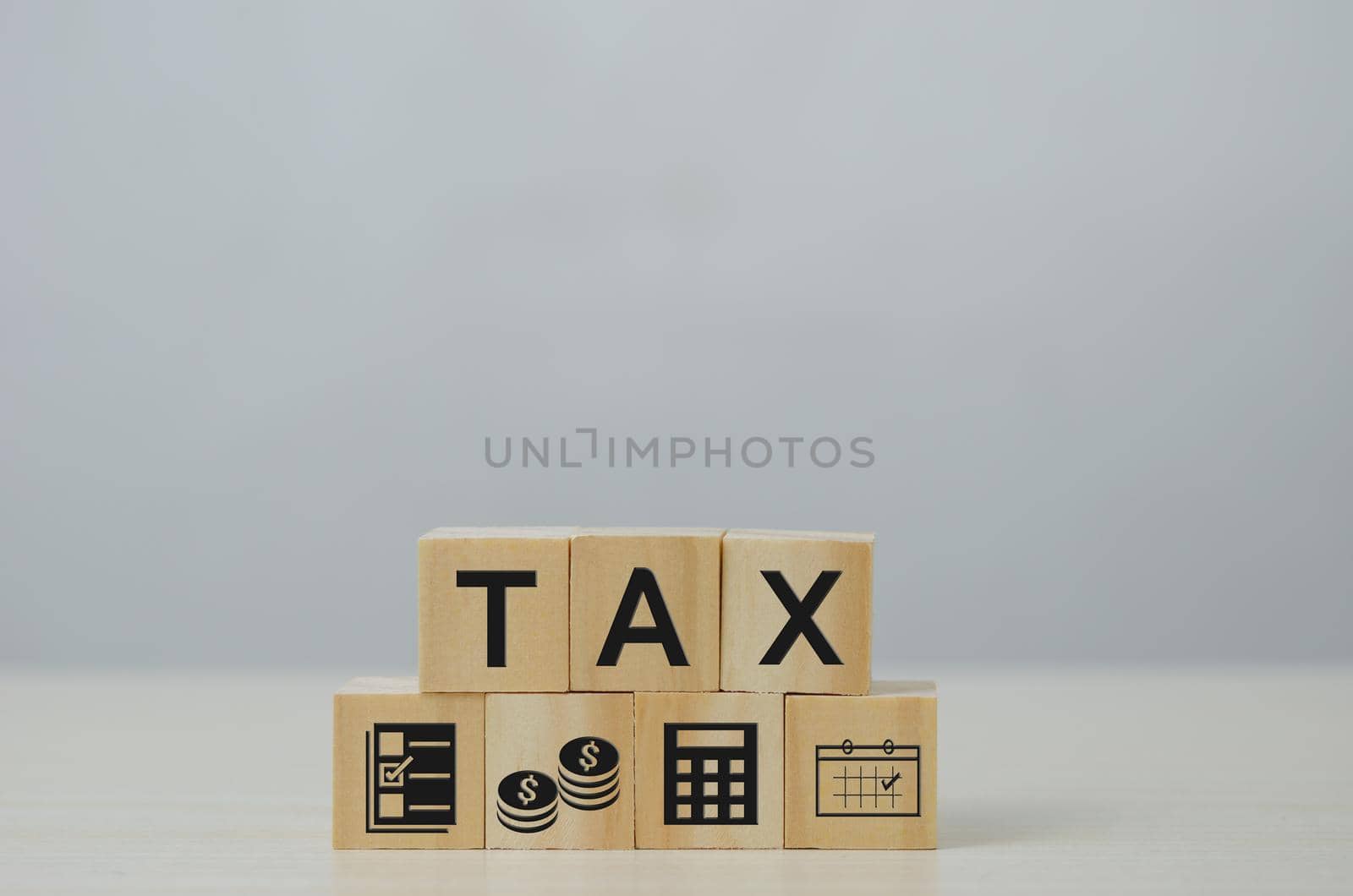 wooden cube block icon TAX business Concept.