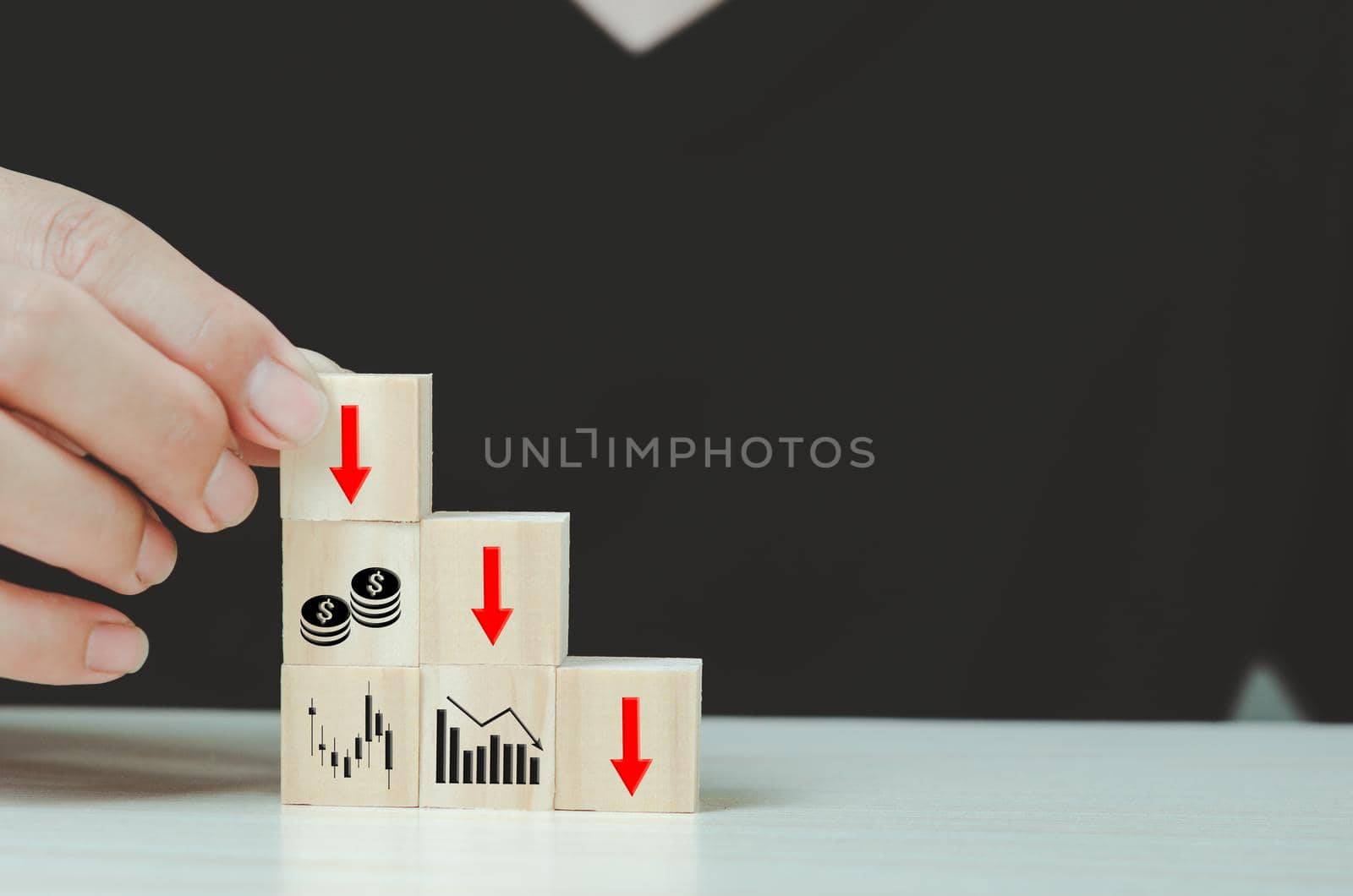 Hand putting and stacking wooden cubes  for icons or symbols Stock market exchange trading graph analysis investment indicator. by aoo3771