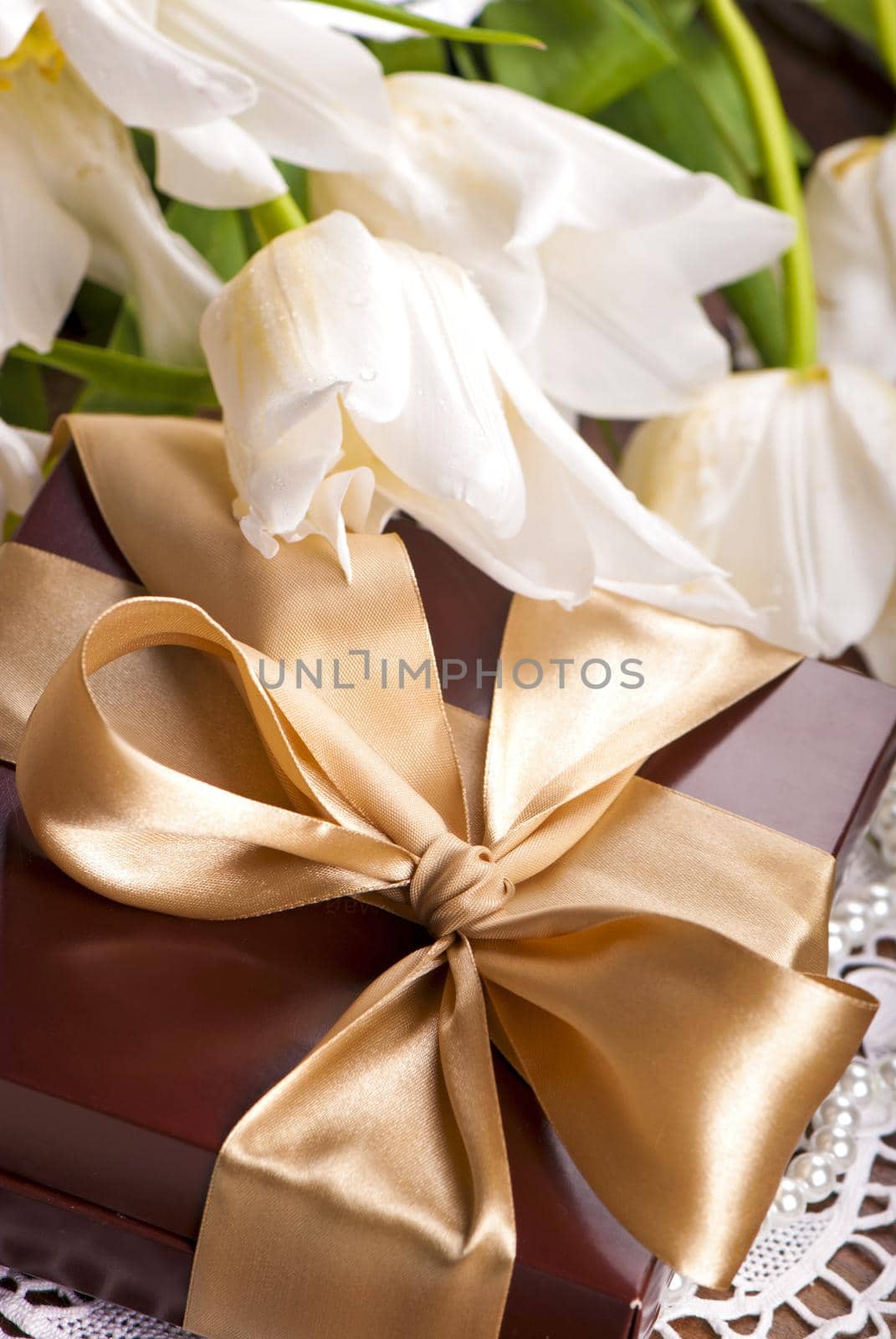 Elegant gift box with daisy flower close up