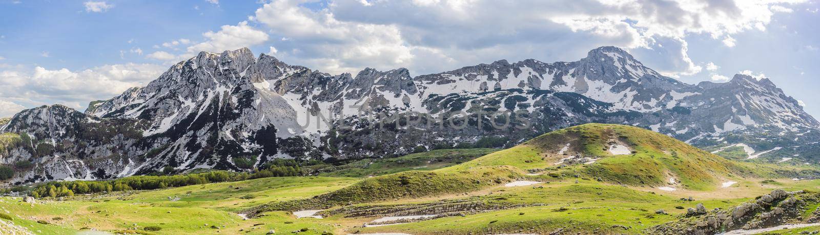 Mountain lake landscape on Durmitor mountain in Montenegro beautiful Durmitor National park with lake glacier and reflecting mountain.