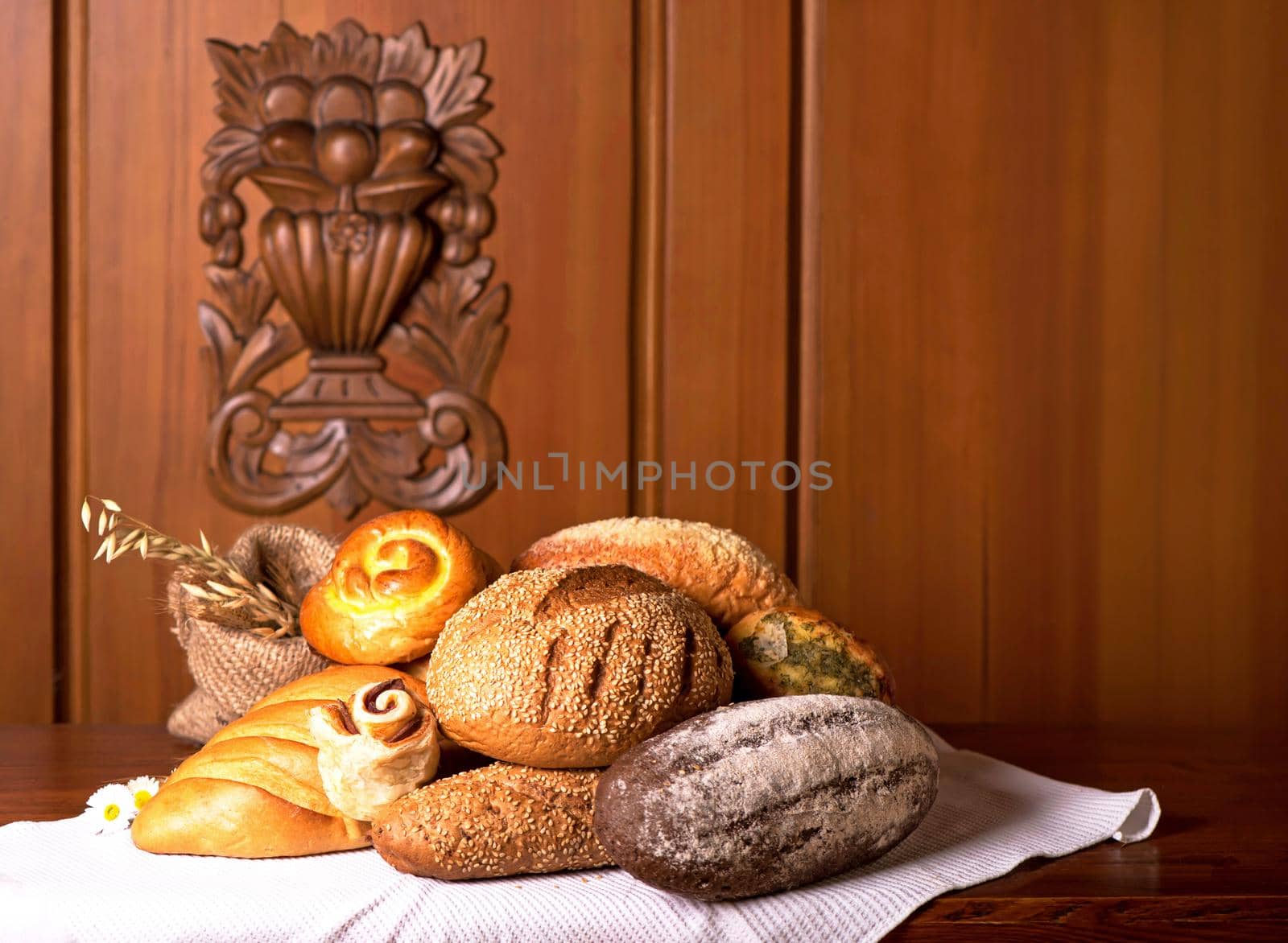 fresh bread and wheat on the wooden