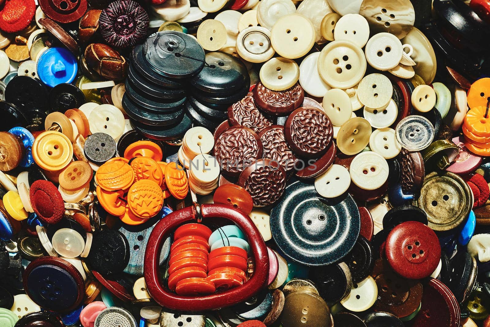 A large number of different multi-colored buttons. by jovani68