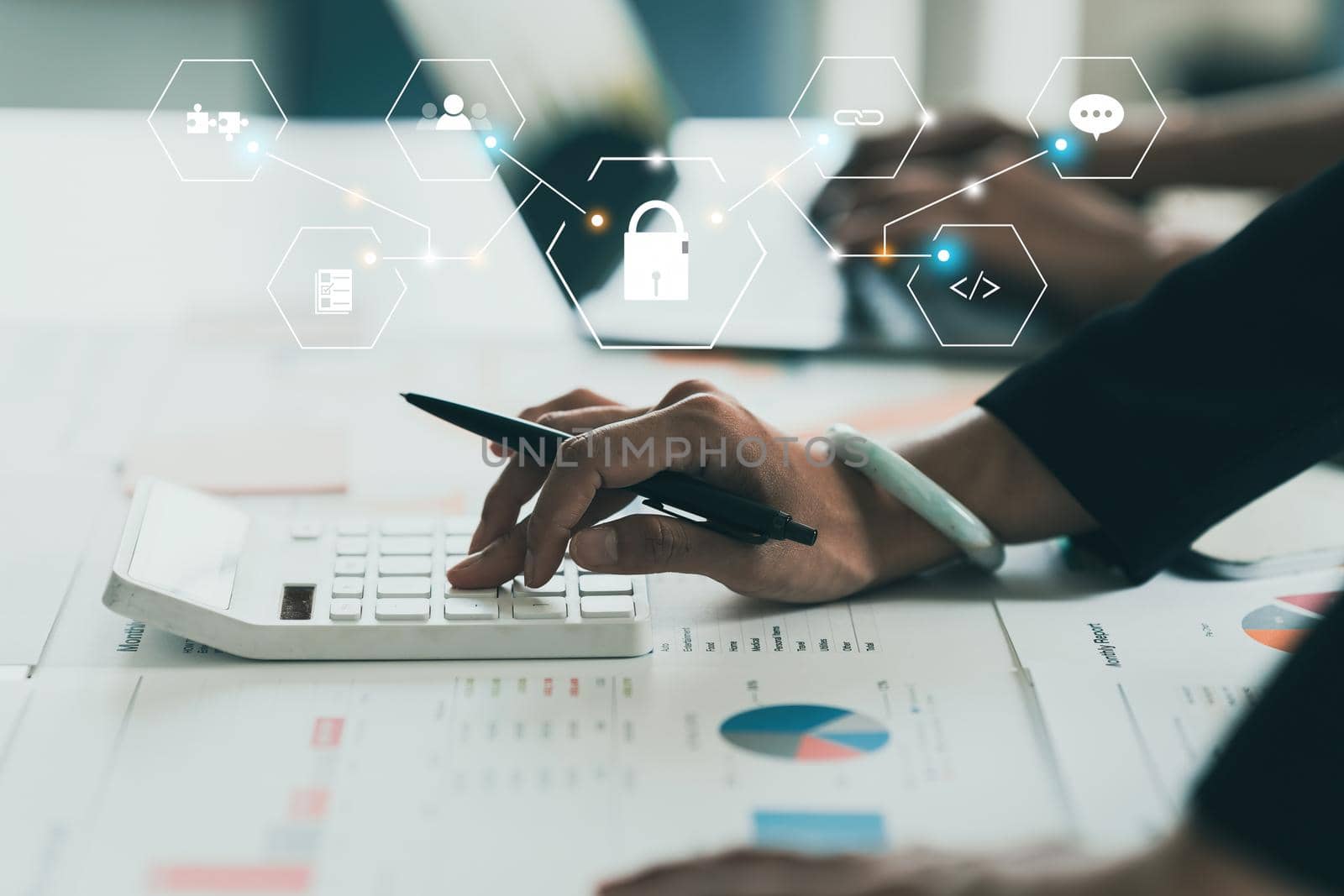 Close up Business woman hand using calculator to calculate the company's financial results and budget. Account Audit Concept