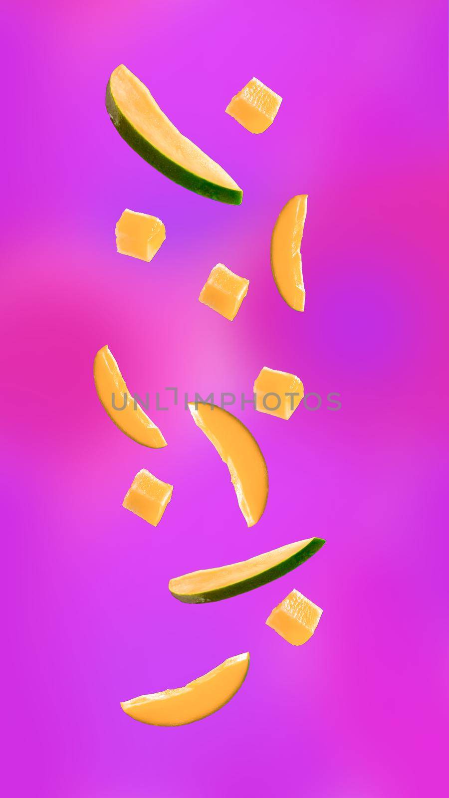 Falling slices of mango on a neon background. Club and party atmosphere. Fruit in fashionable neon colors and lights