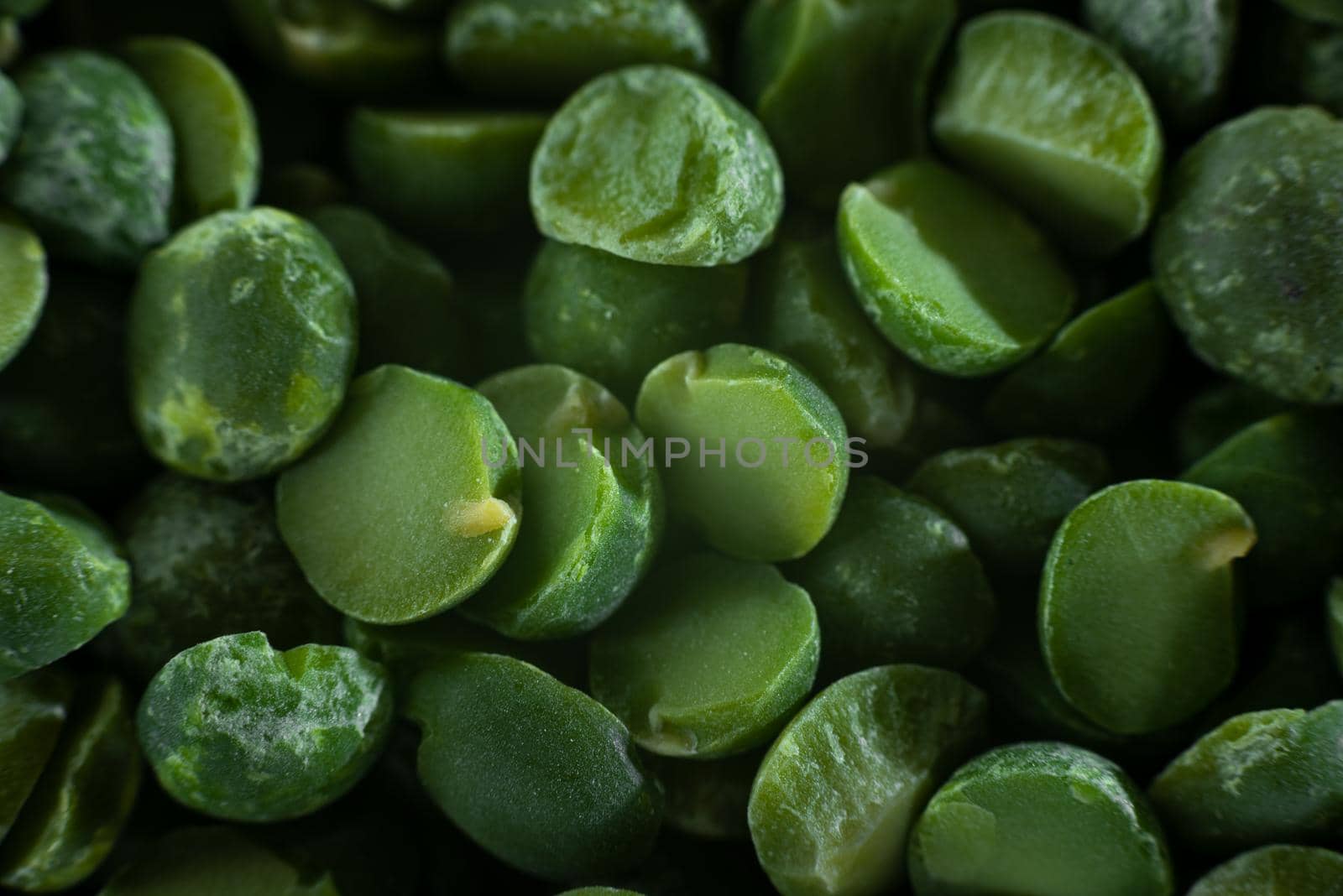 Extreme closeup. Ground chopped green peas. Green Peas. Green background. Peas background. Top view. Superfood. Healthy, gluten-free meals