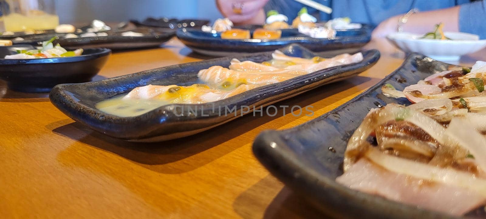 japanese food dish in an oriental restaurant with wooden table and light background