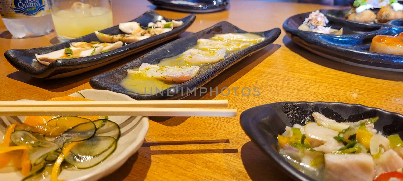 japanese food dish in an oriental restaurant with wooden table and light background