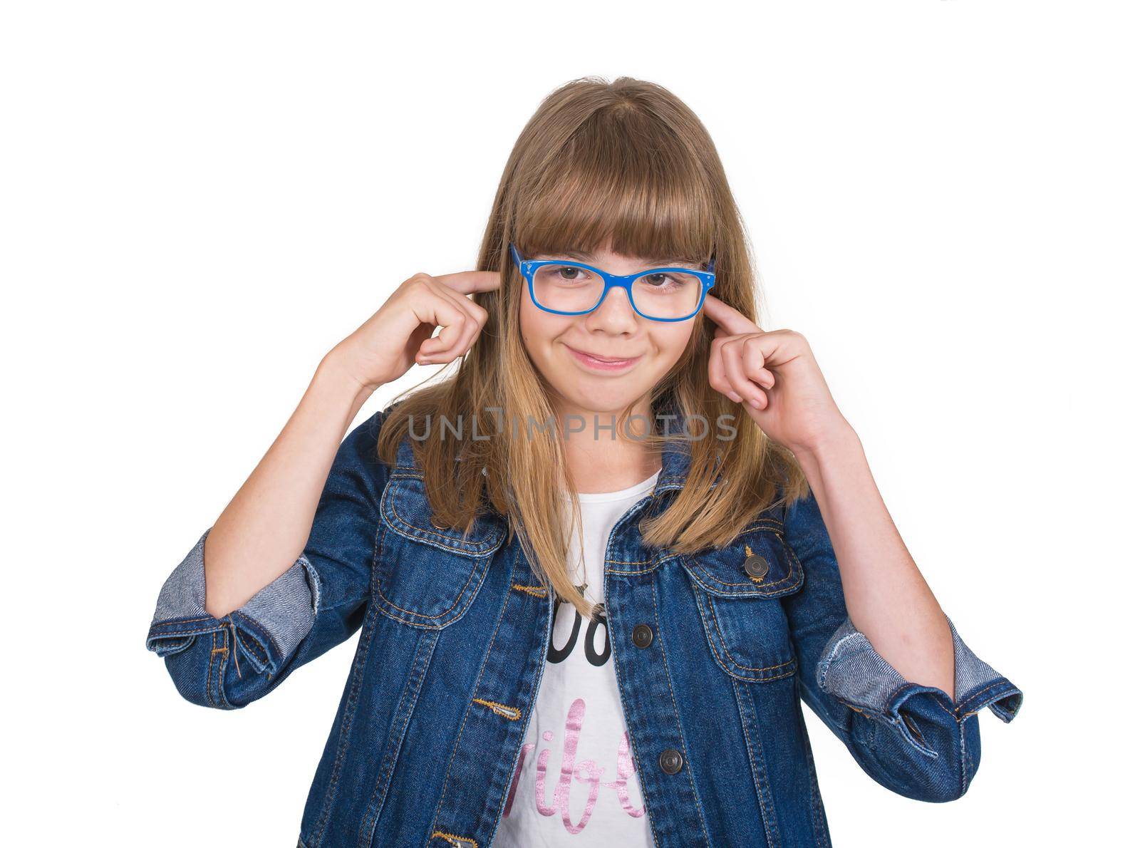 Teenager with eyes closed closes her ears with hands, isolated on white by aprilphoto