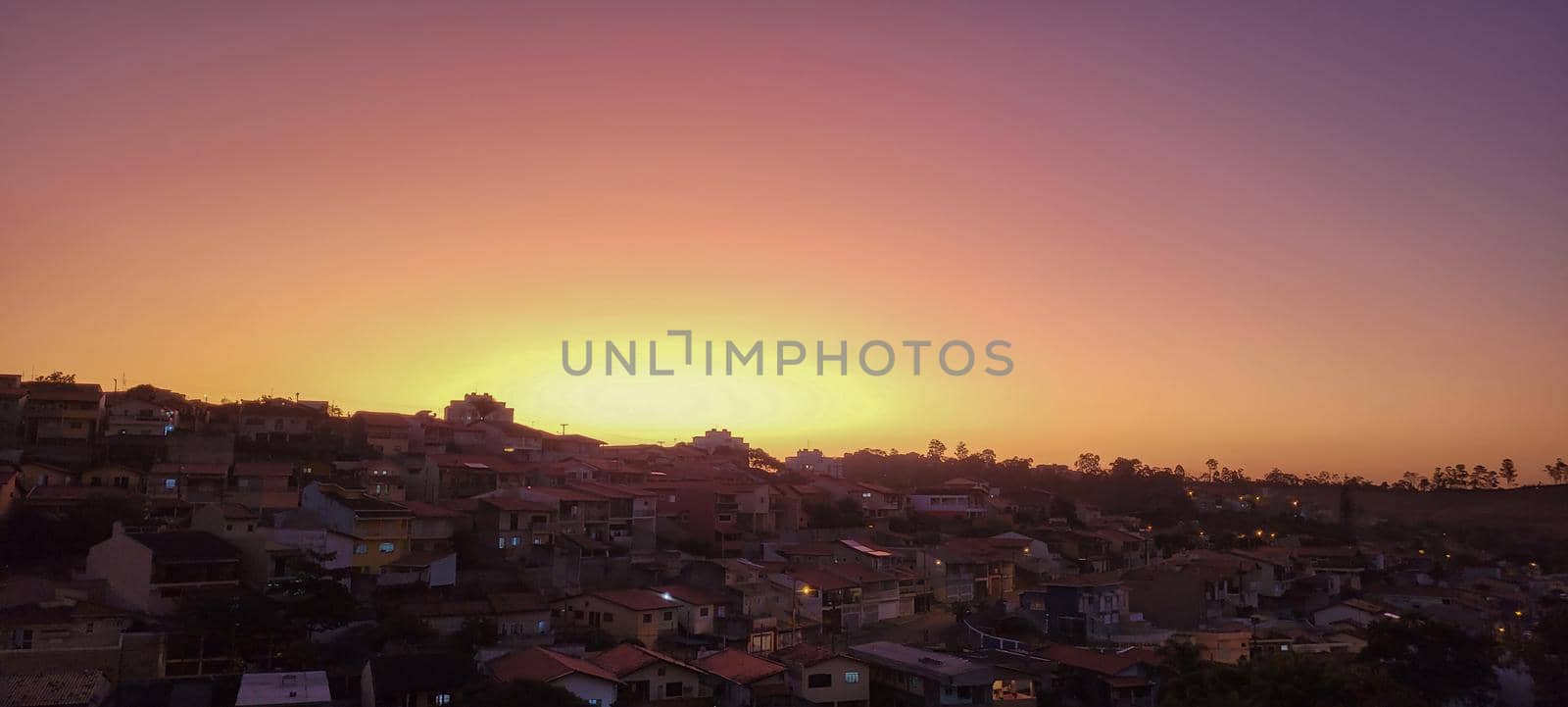 colorful late afternoon sunset in the countryside of Brazil by sarsa