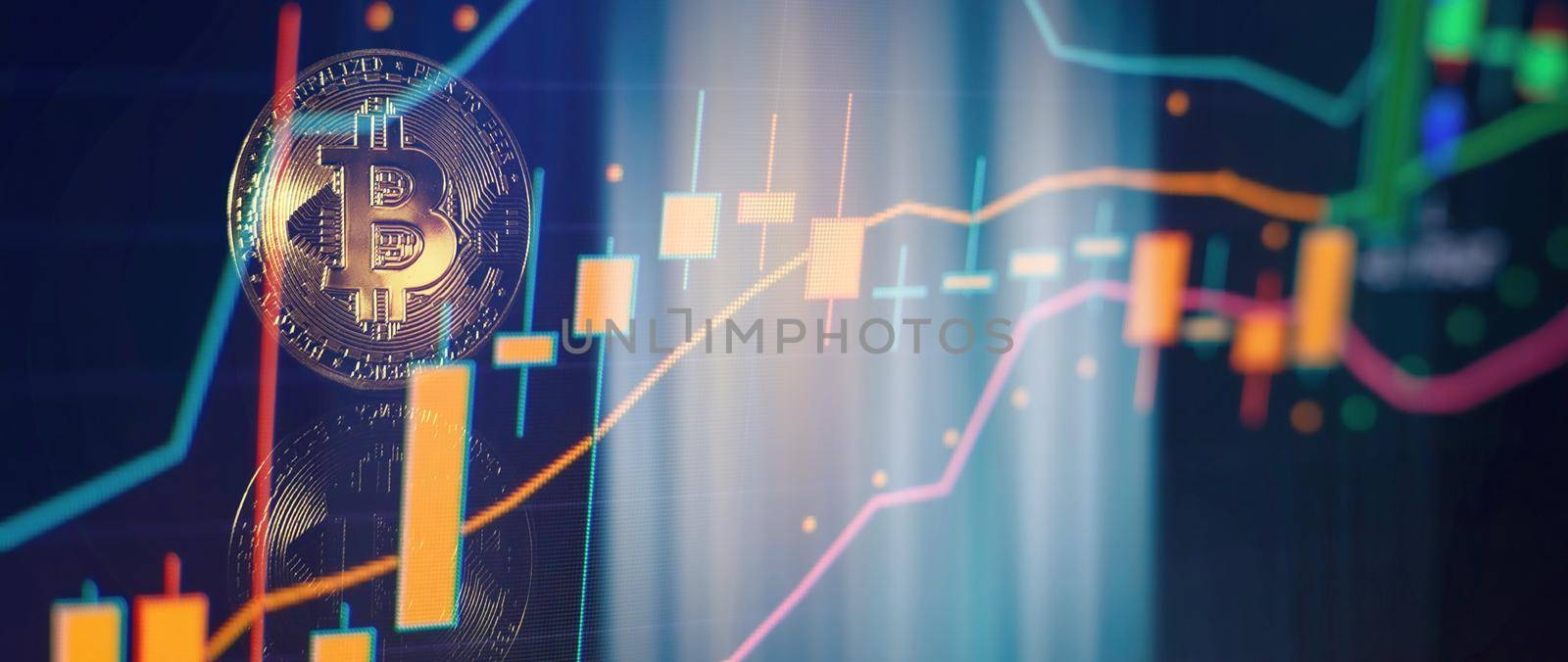 Bitcoins with Candle stick graph chart and digital background. Mining or block chain technology.