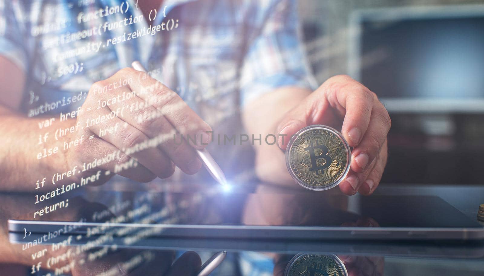 The man is holding a bitcoin coin. Businessman puts in bitcoin. The concept of buying bitcoins. Preservation. Cryptocurrency. Close-up. virtual money