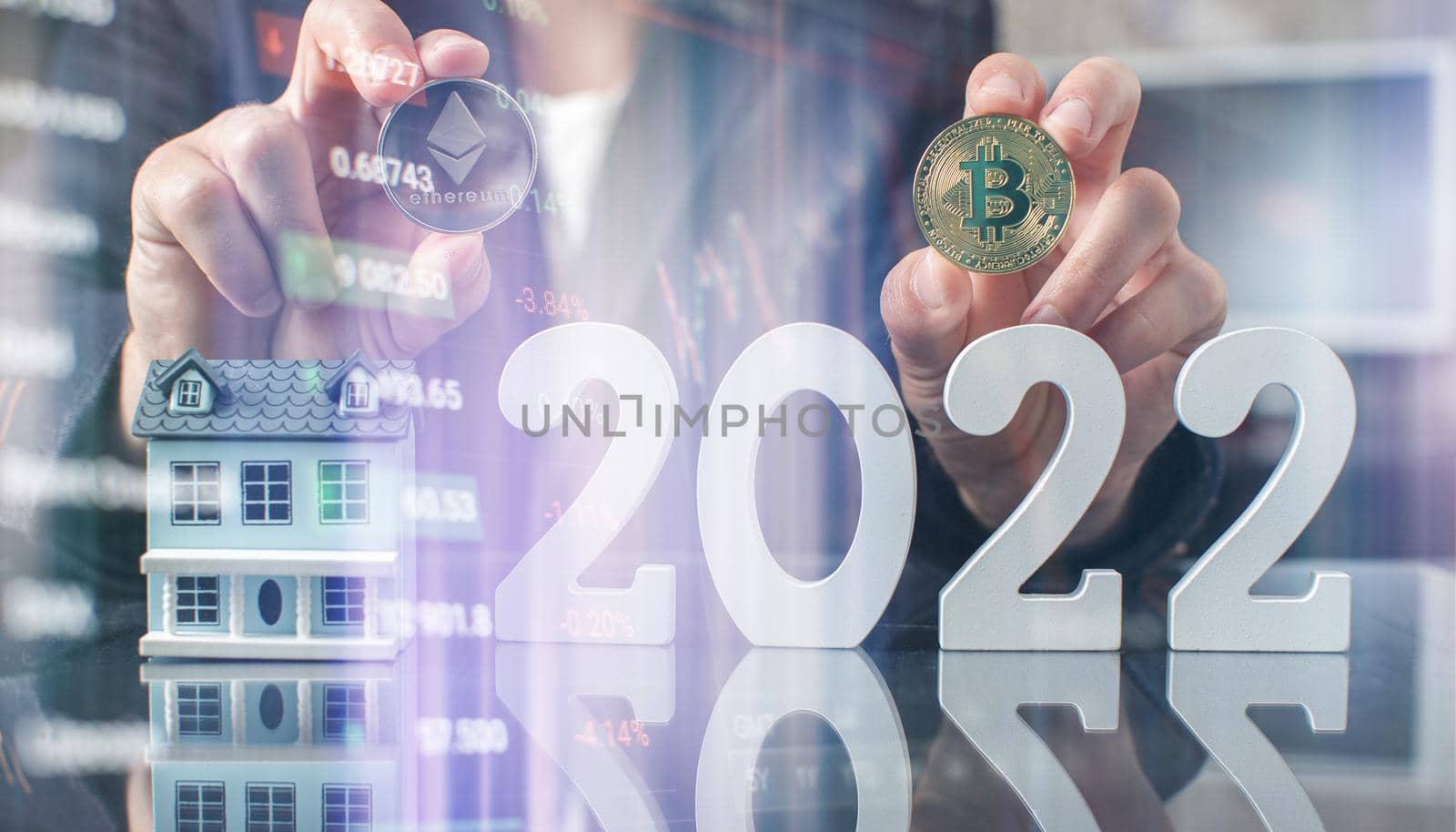Businessman Hand holding bitcoin with pen as part of business network on 2022 background. bitcoin cryptocurrency idea concept and virtual financial chart chart, new virtual currency digital symbol