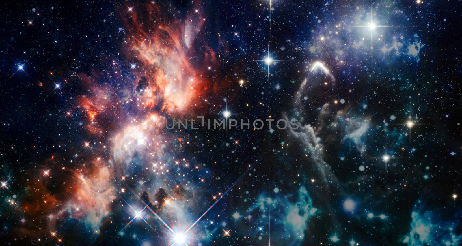Space background with stardust and shining stars. Realistic colorful cosmos with nebula and milky way.