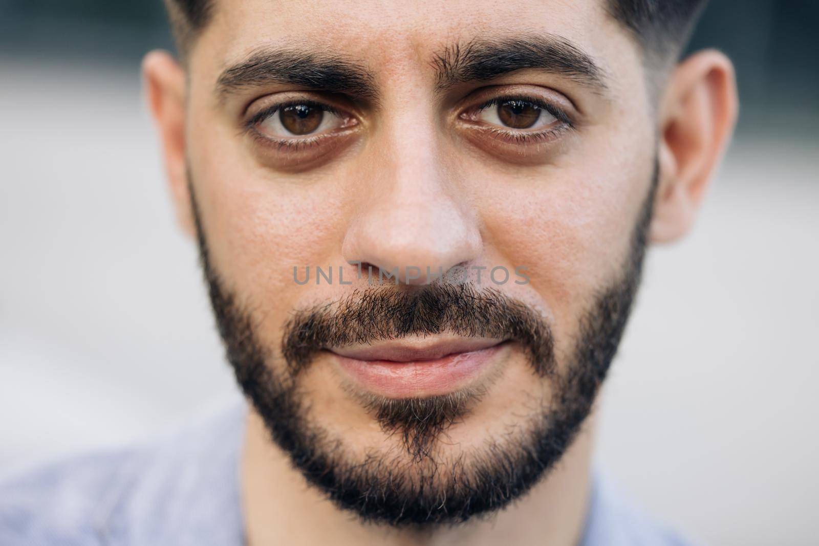 Caucasian young bearded man in formal outfit looking to camera outside on street feel happy businessman portrait business modern manager pretty.