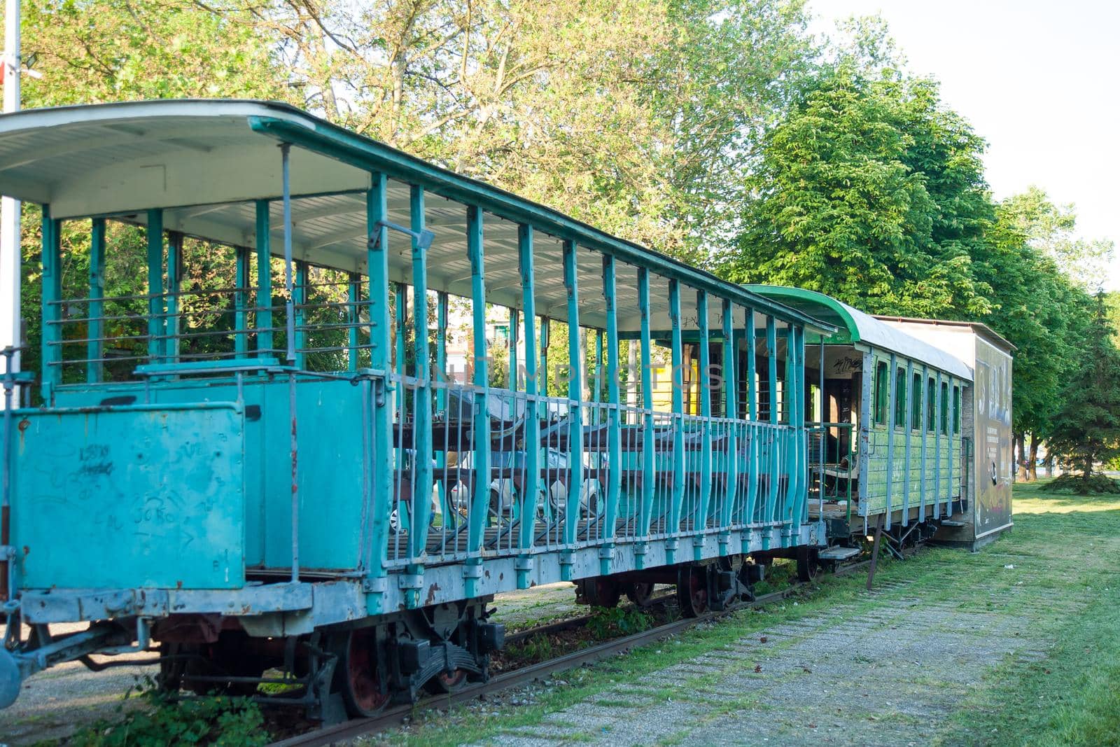 Old rusty tram. An old dilapidated tram at the dump. Tram the ghost. Destruction of old machinery. by zebra