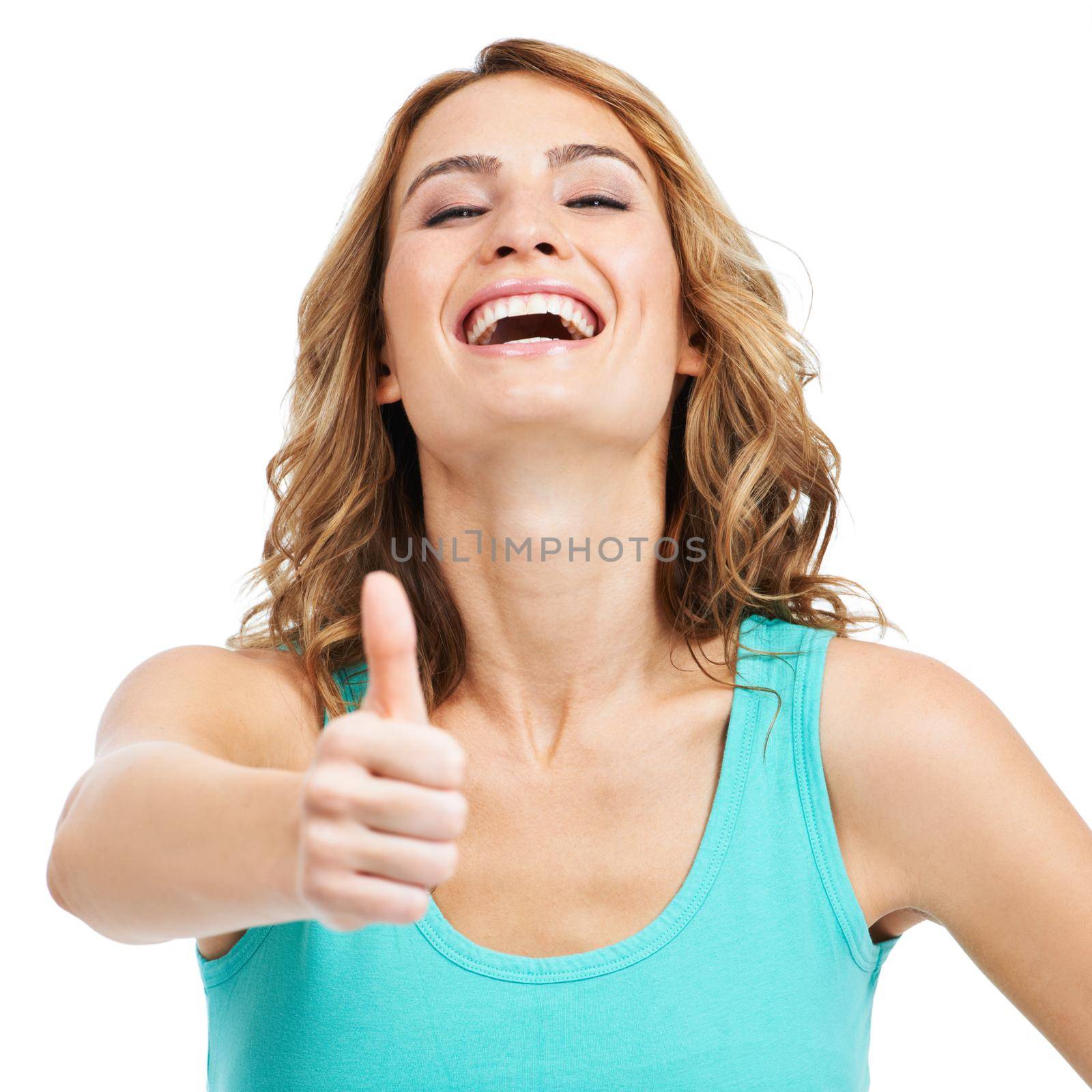 An excited young beauty giving you a thumbsup while isolated on a white background.