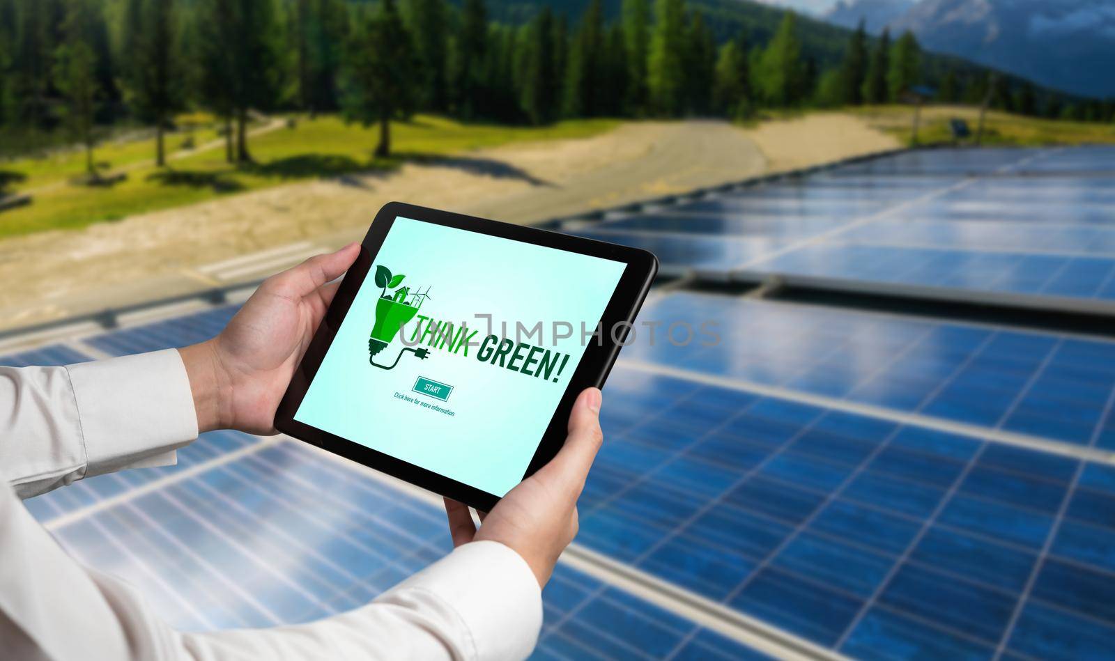 Green business transformation for environment saving and ESG business concept. Businessman using tablet to set corporate goal toward environmental friendly management and alternative clean energy use.