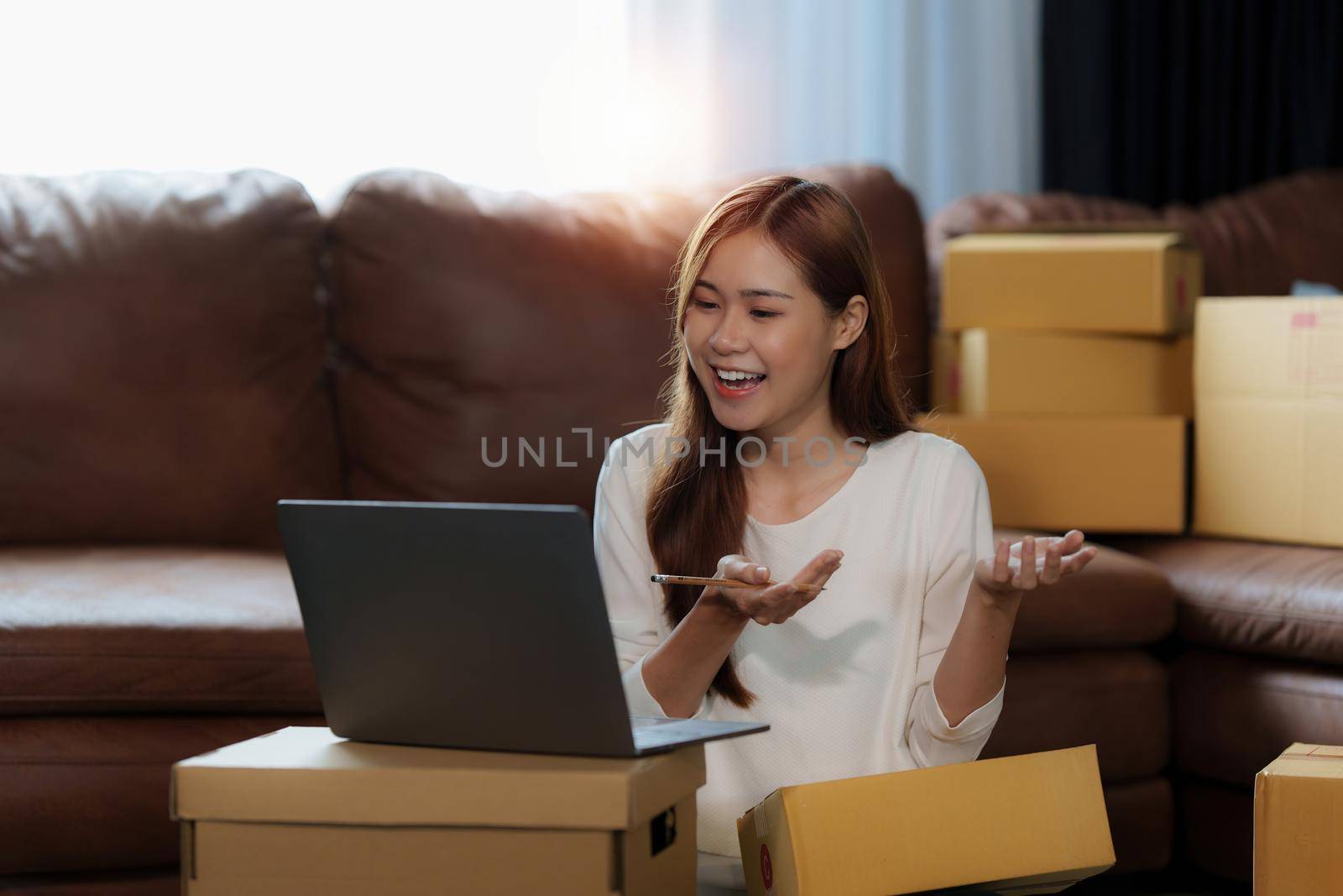 Portrait of Starting small businesses SME owners female entrepreneurs working at home office. online shopping, sale, promotion