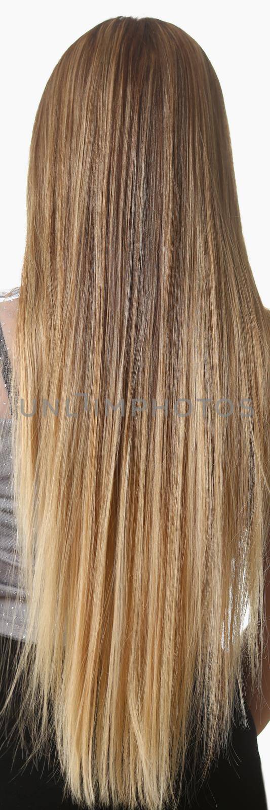 Womans back and long luxury shiny blonde hair, female after beauty salon by kuprevich