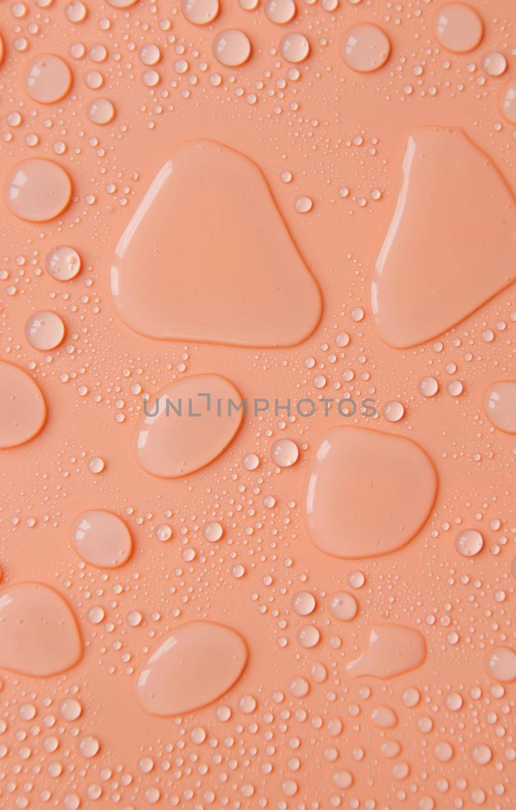 Drops of liquid, moisturizing cosmetic product. Hyaluronic acid. Selective focus. Nature.