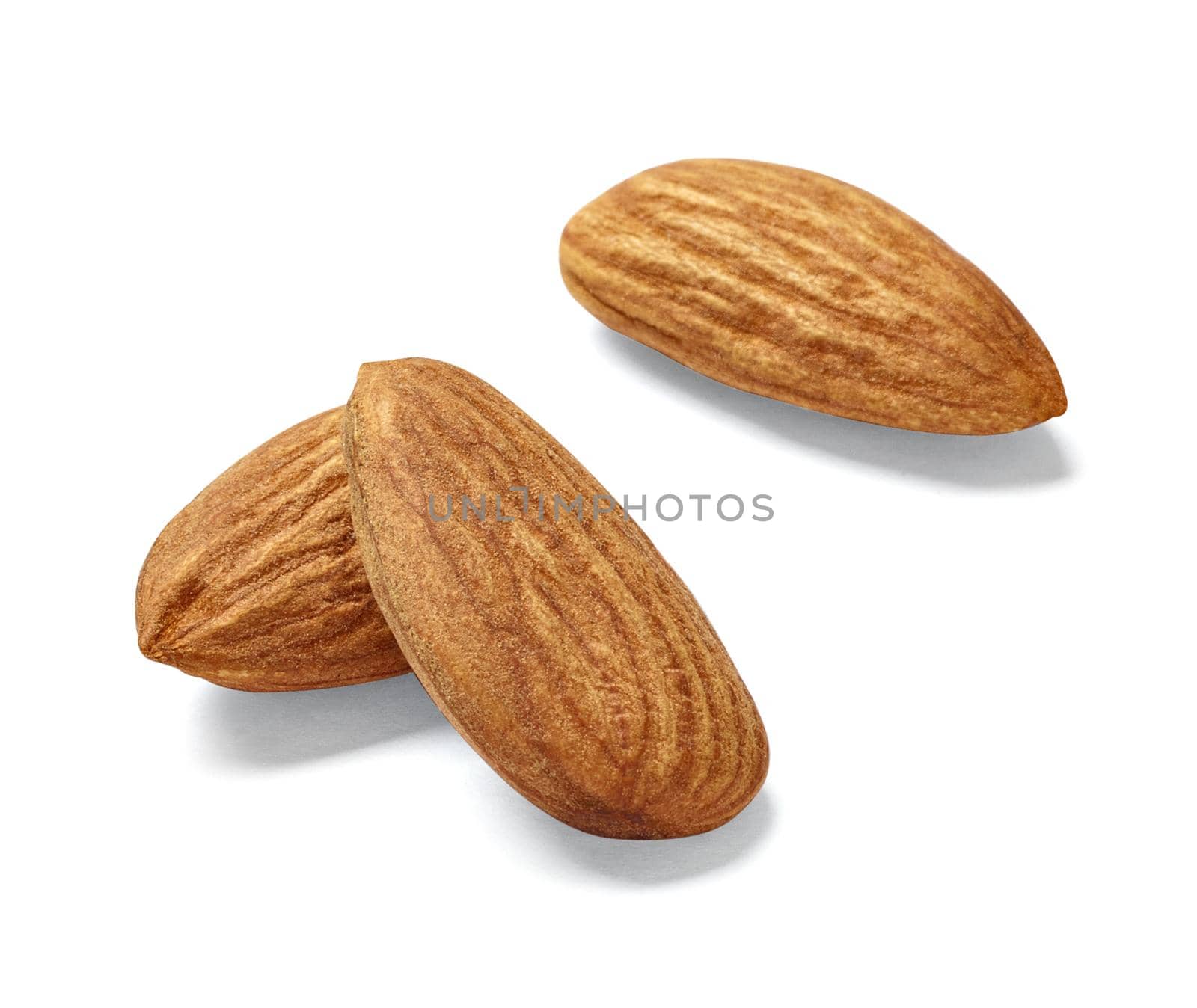 Close up of almonds on white background