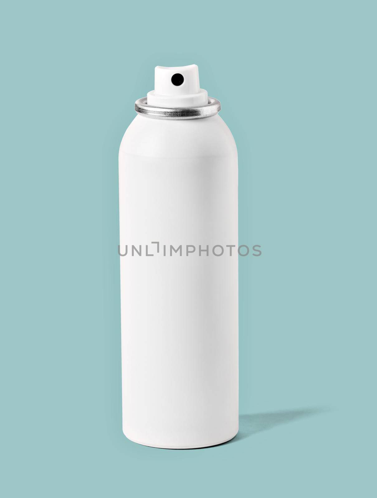 Close up of a spray aerosol bottle on white background