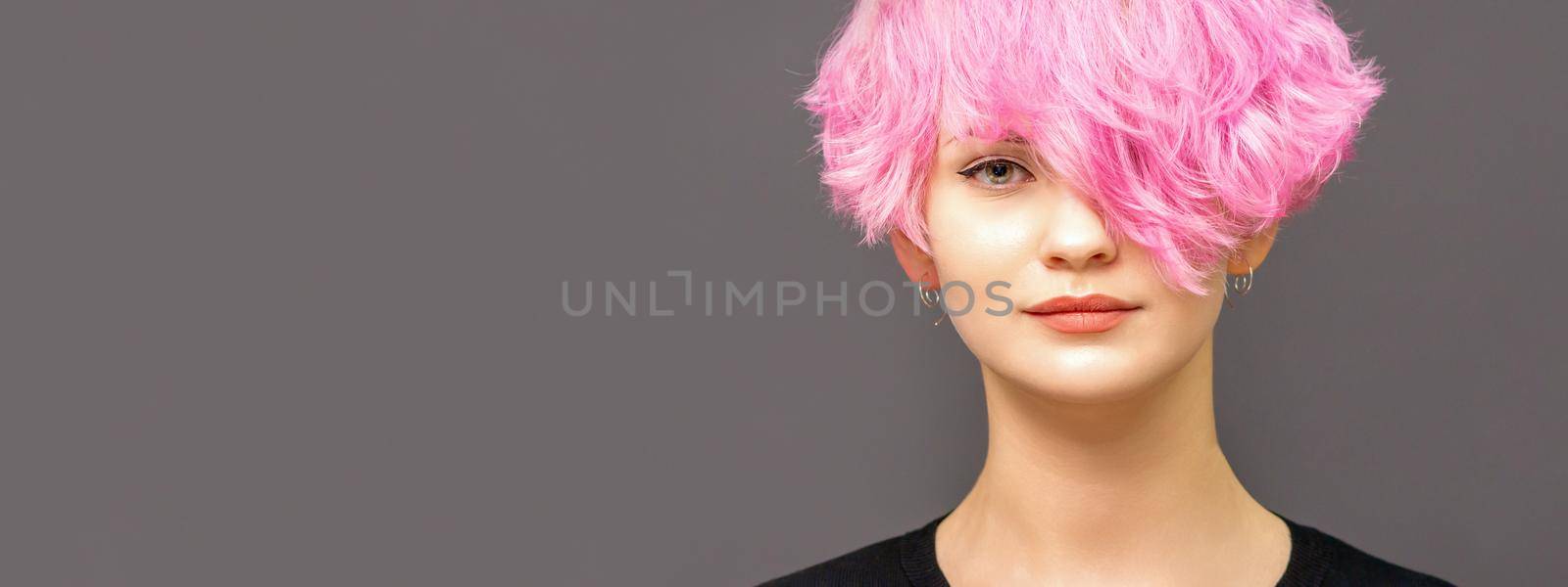 Young woman with pink hair by okskukuruza