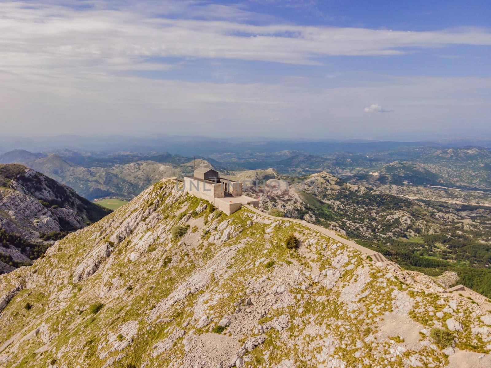 Montenegro. Lovcen National Park. Mausoleum of Negosh on Mount Lovcen. Drone. Aerial view. Viewpoint. Popular tourist attraction. Petar II Petrovic-Njegos mausoleum on the top of mount Lovchen in Montenegro. Aerial view, drone.